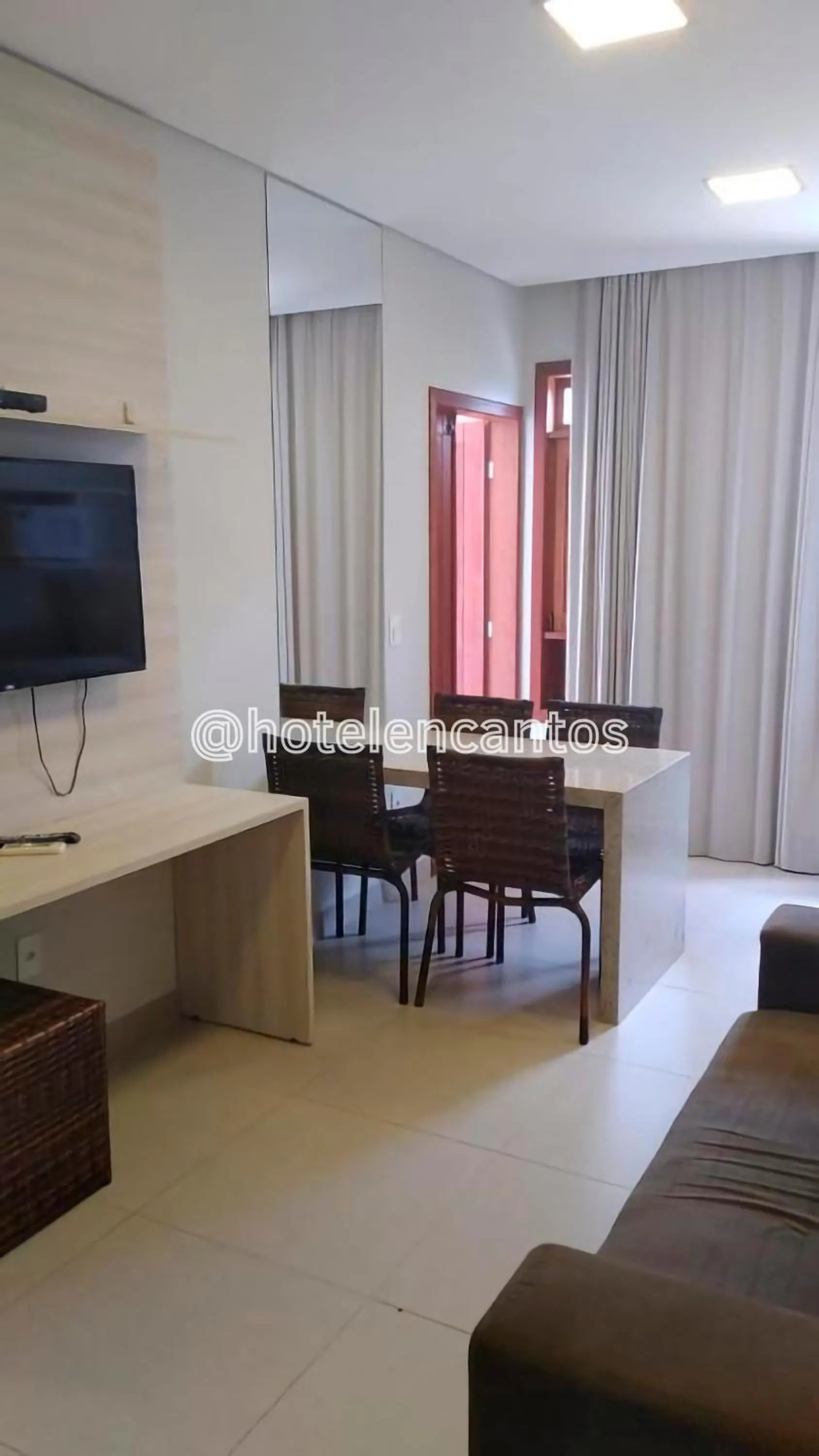 Living room in Hotel Encantos de Itaperapuã