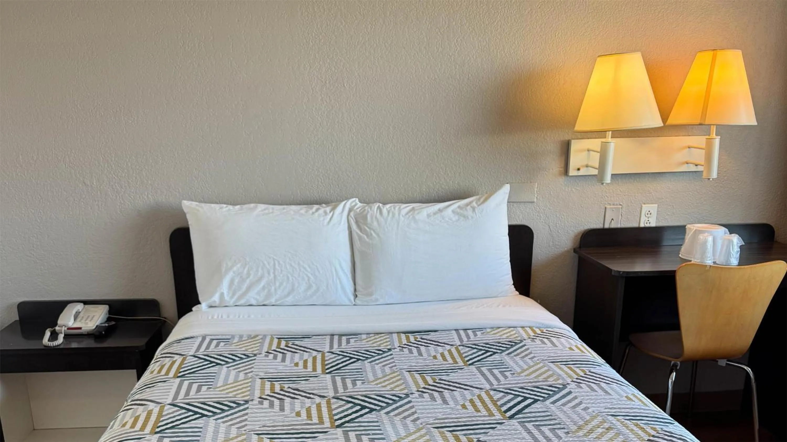 Photo of the whole room, Bed in Studio 6 Suites Las Vegas, NV - Tropicana