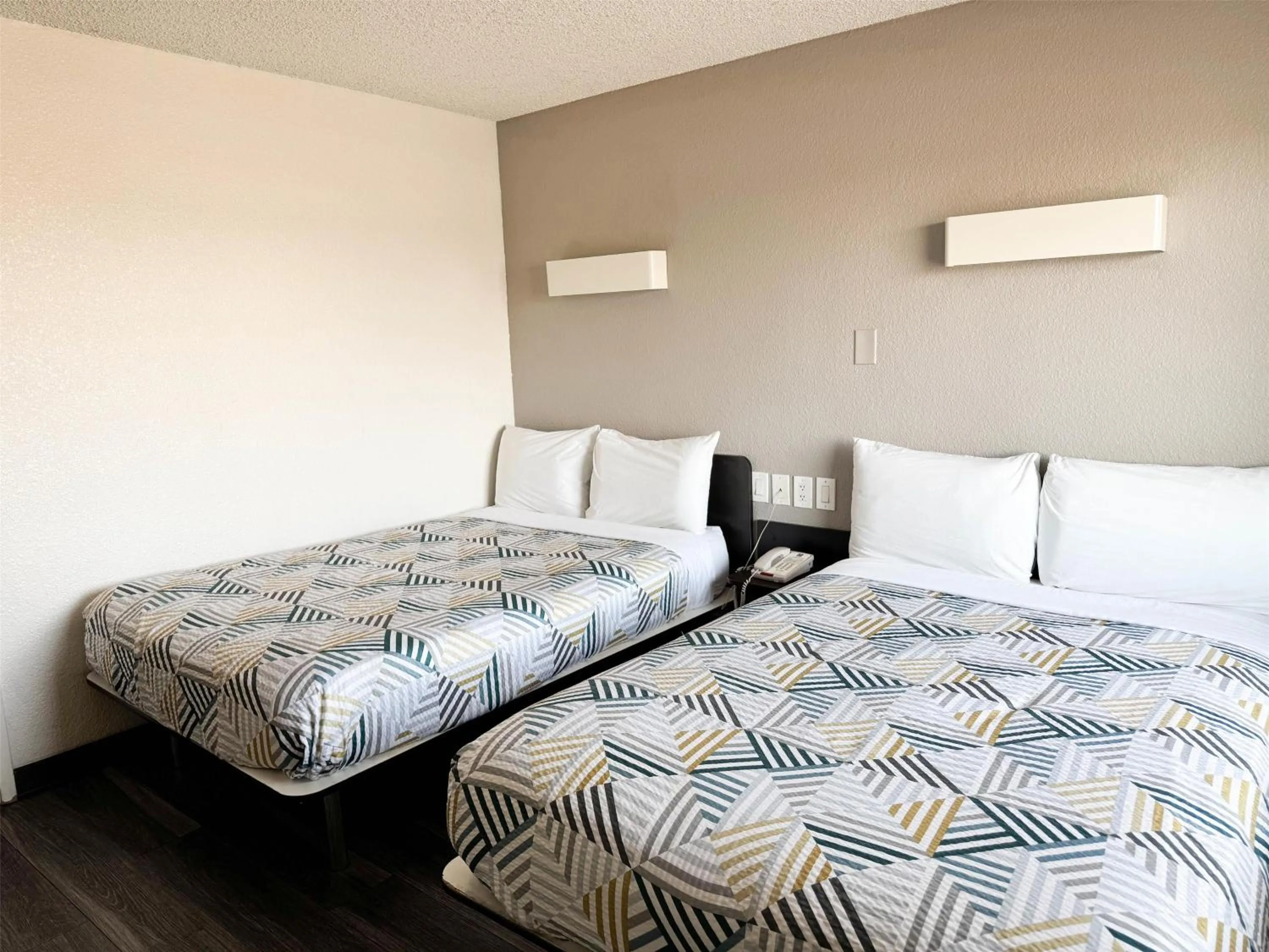 Photo of the whole room, Bed in Studio 6 Suites Las Vegas, NV - Tropicana