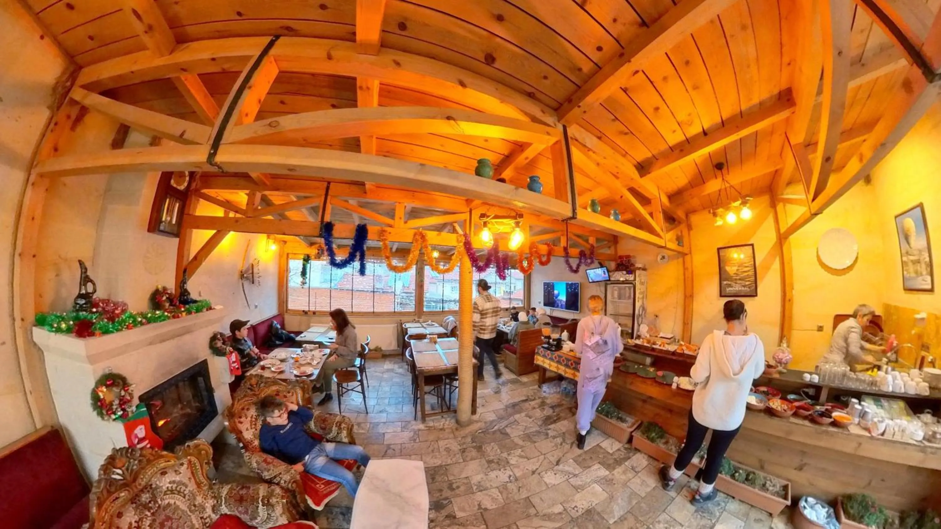 People in Larissa Cave Hotel