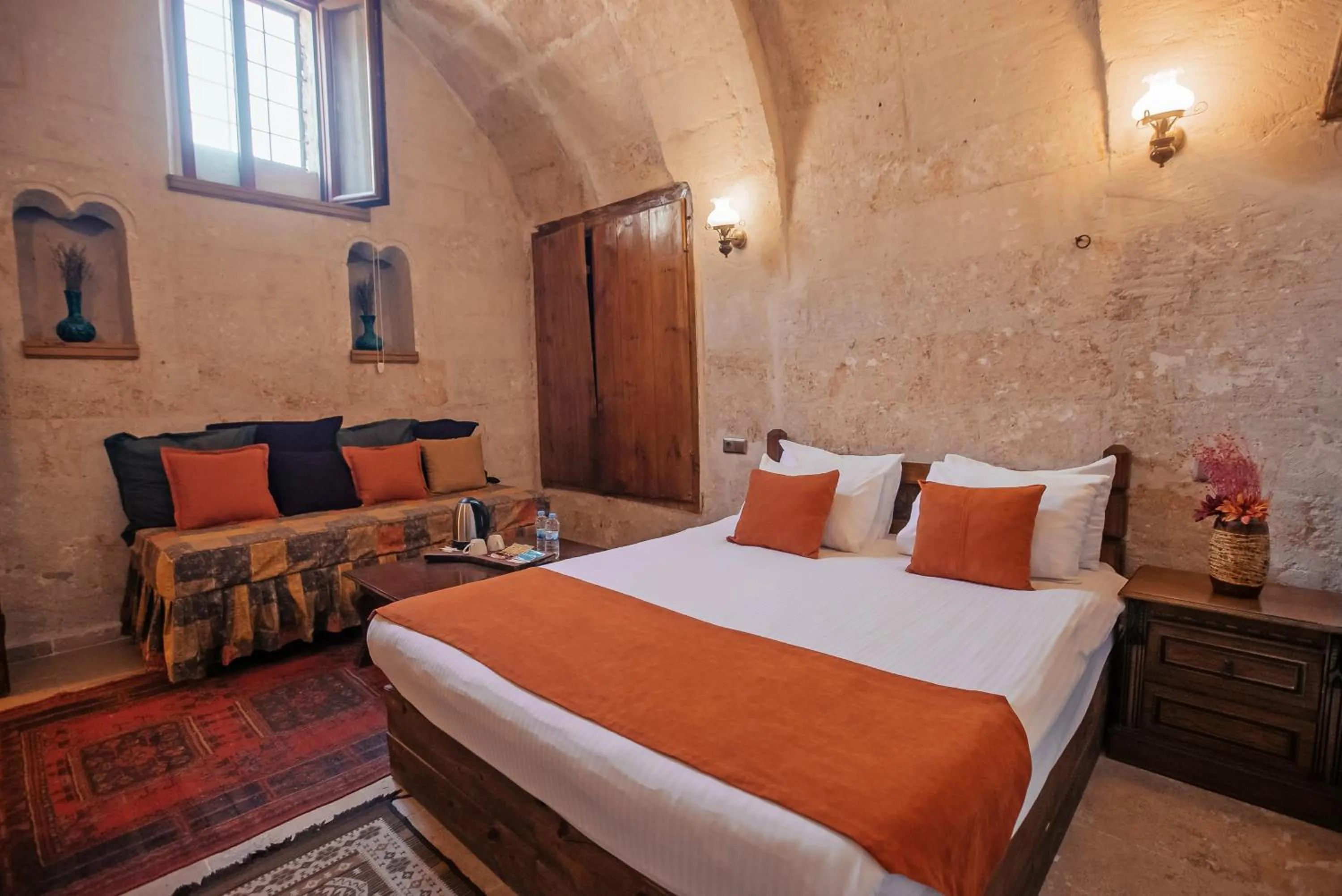 Bed in Larissa Cave Hotel