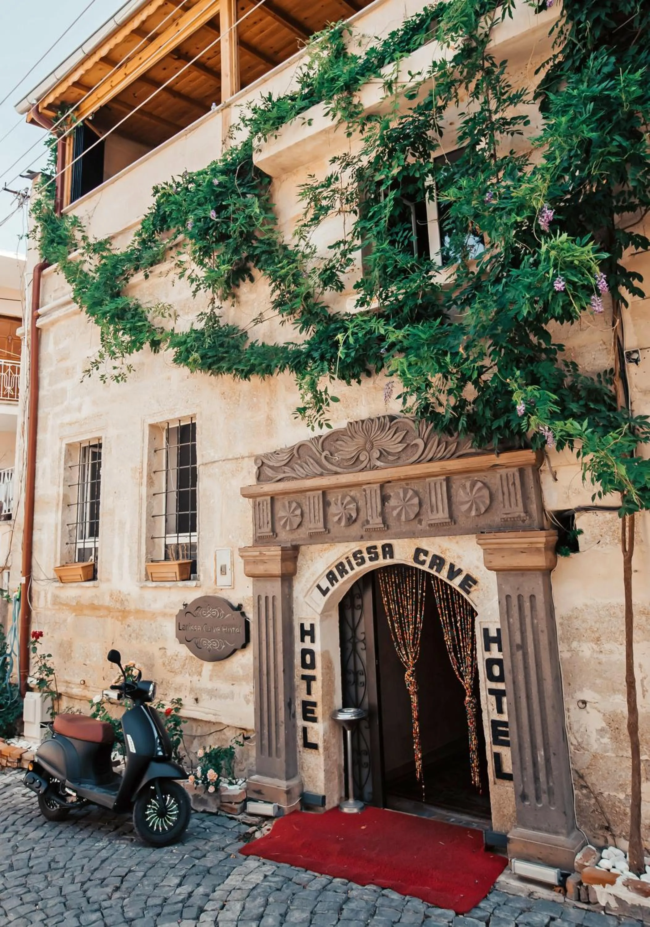 Facade/entrance in Larissa Cave Hotel