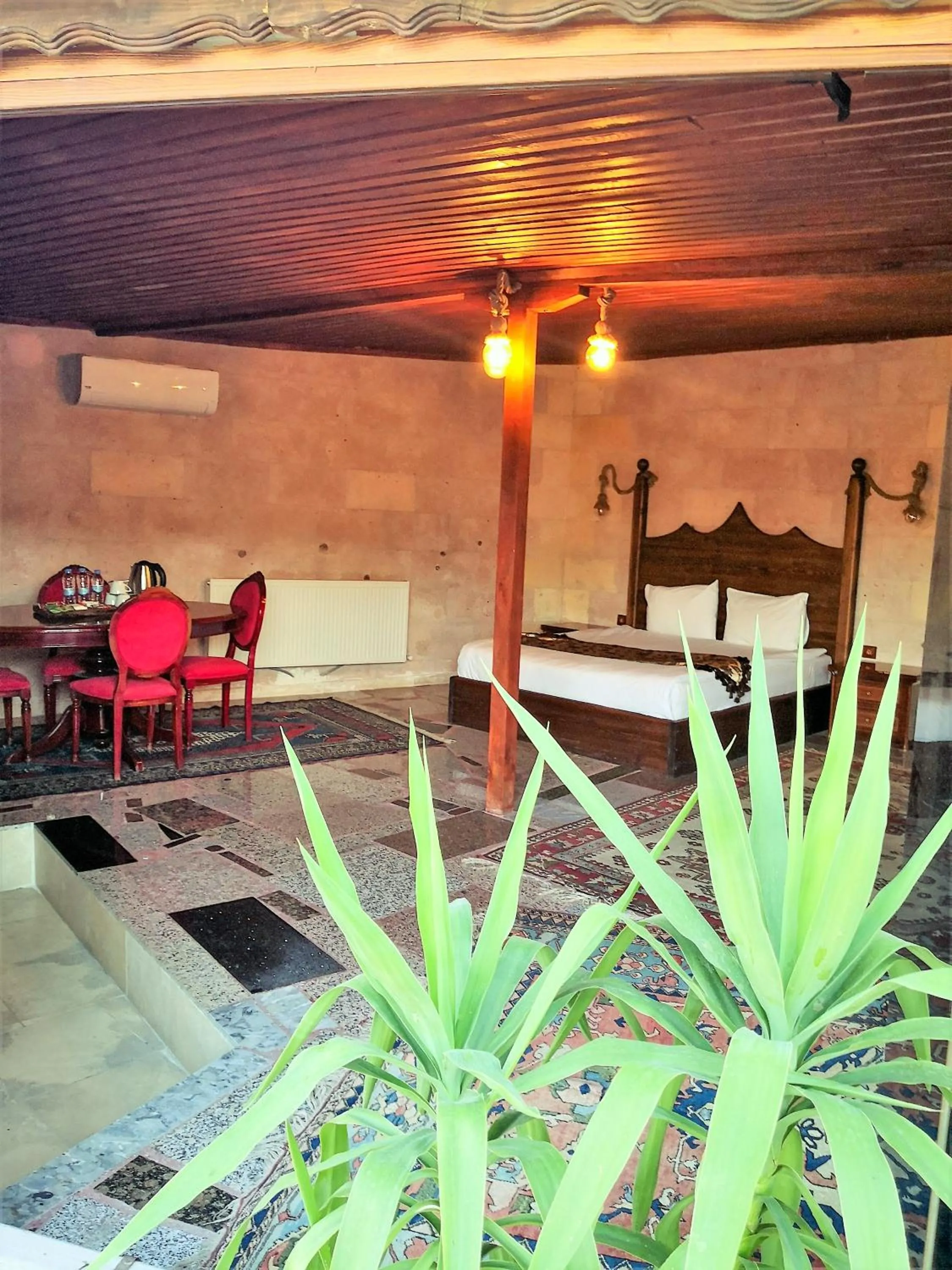 Photo of the whole room in Larissa Cave Hotel