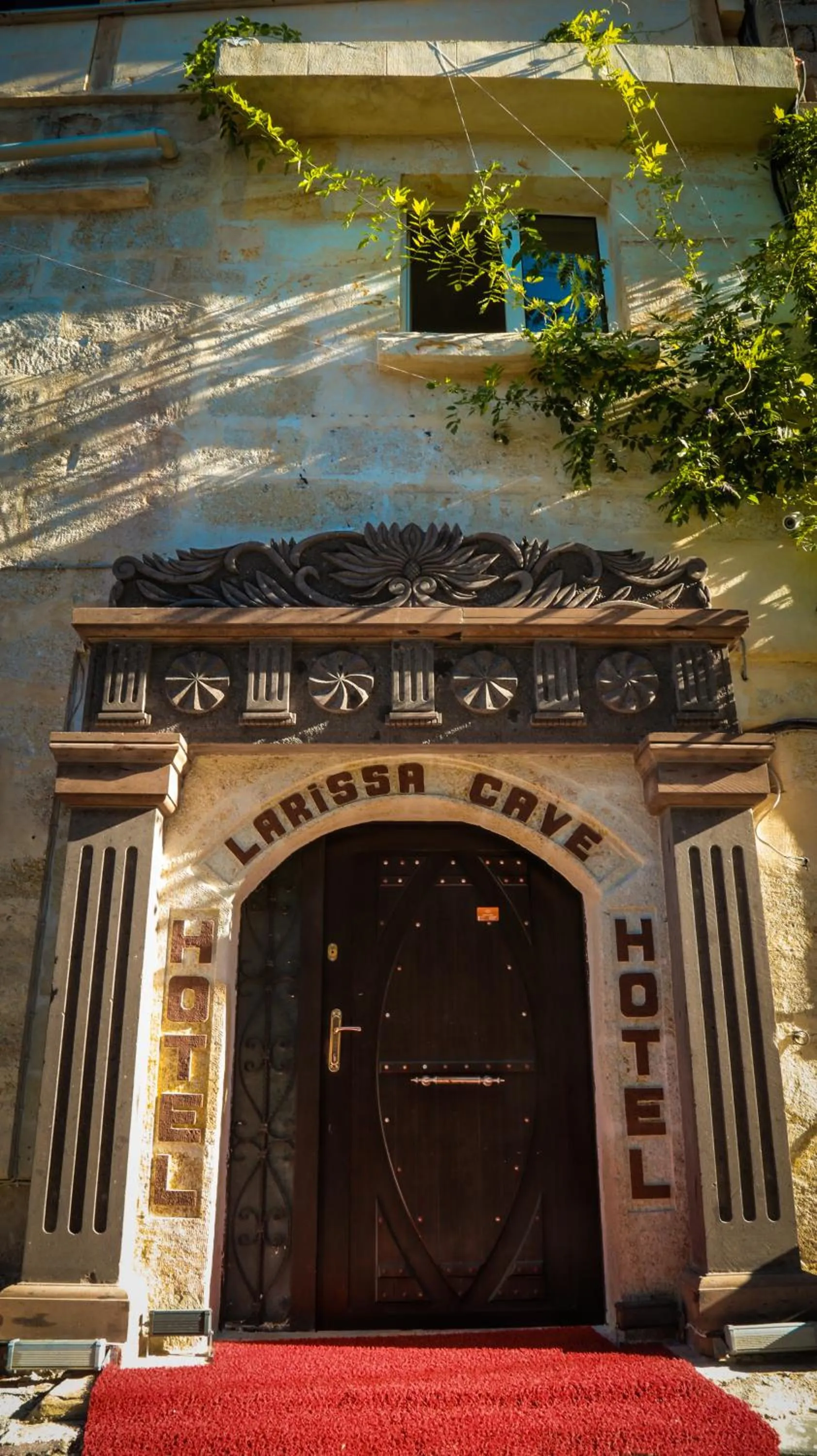 Facade/entrance in Larissa Cave Hotel