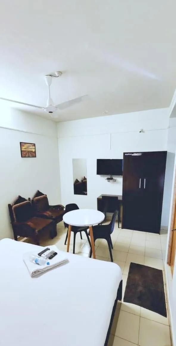 Photo of the whole room, Bed in Apsara Residency