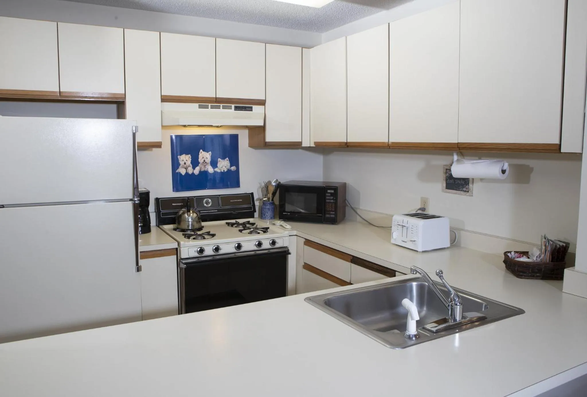 Kitchen or kitchenette in Okemo Mountain Lodging