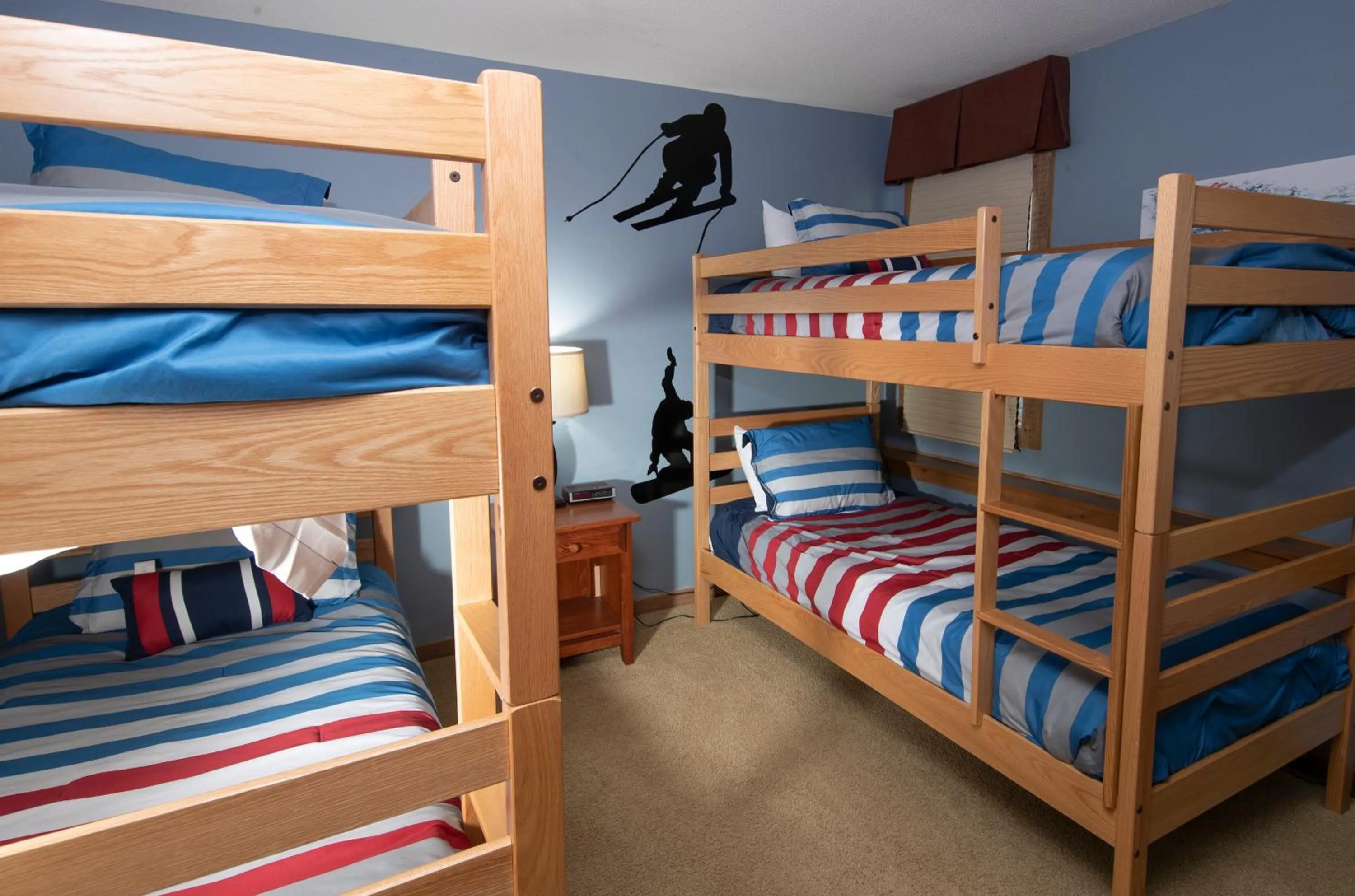 Bed in Okemo Mountain Lodging