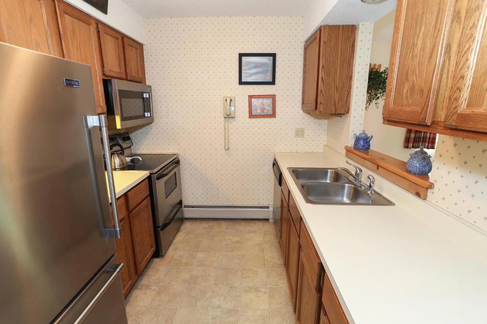 Kitchen or kitchenette in Okemo Mountain Lodging