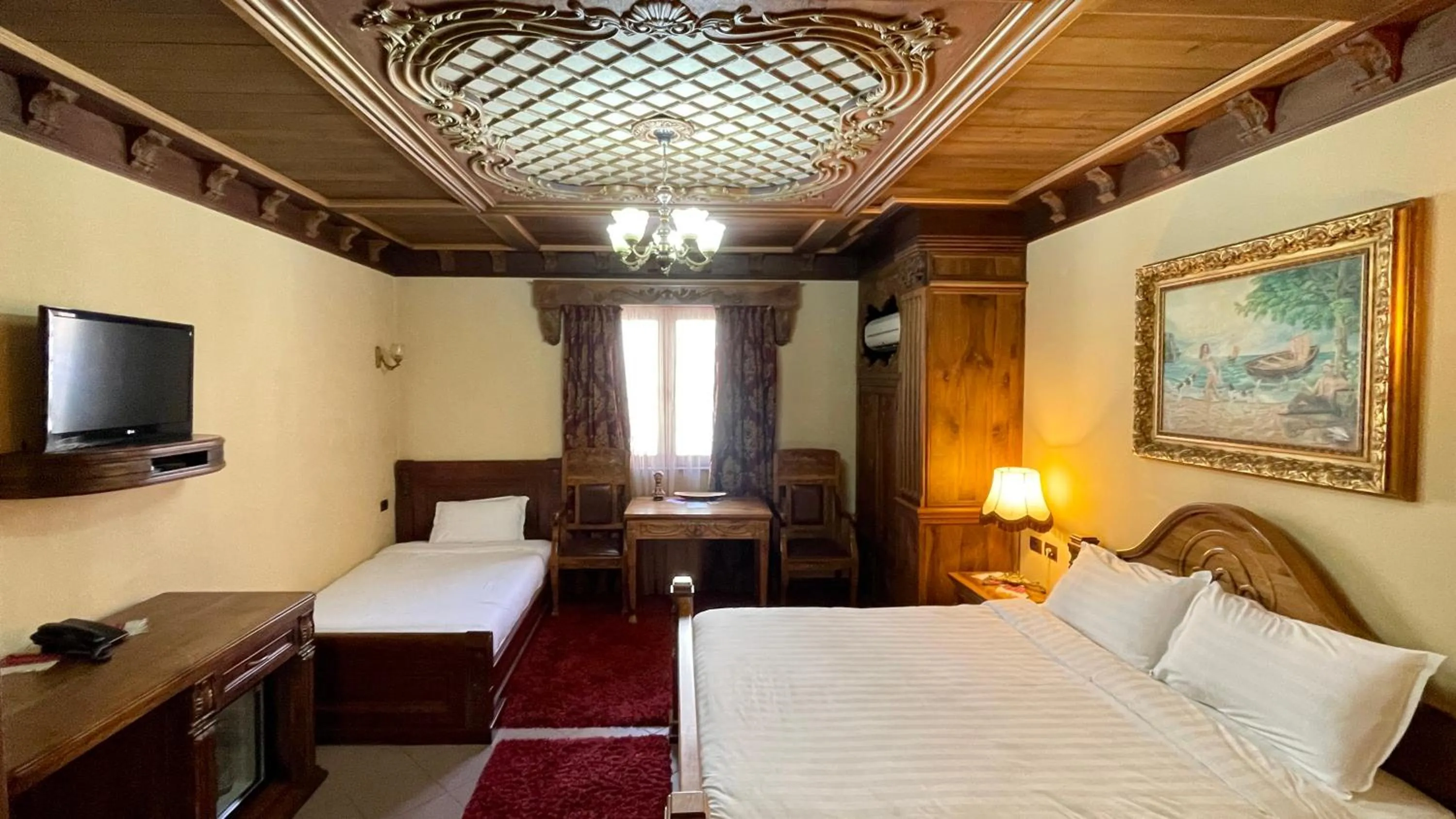 Communal lounge/ TV room, Bed in Brilant Antik Hotel