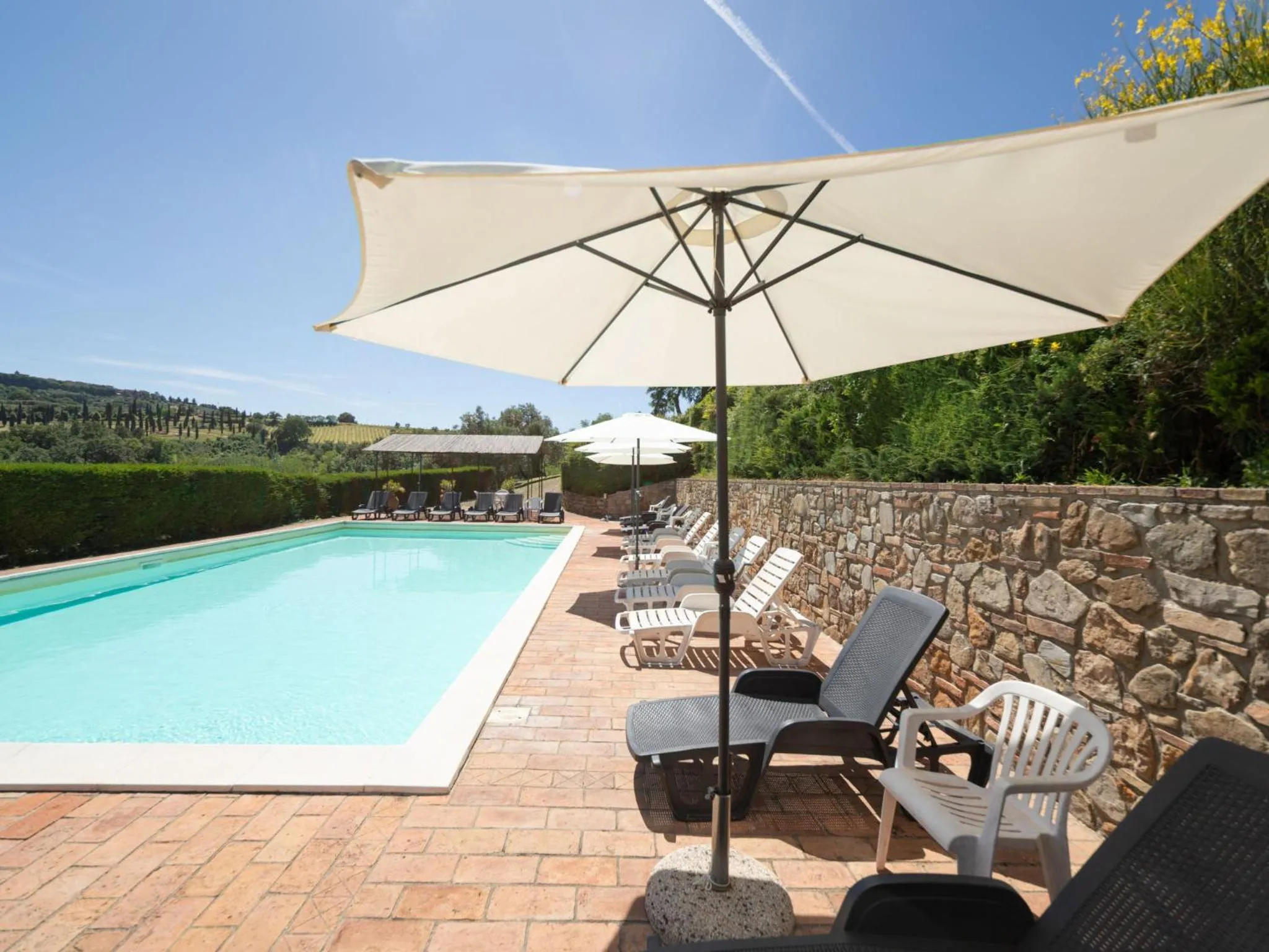 Swimming pool in Apartment Galileo by Interhome