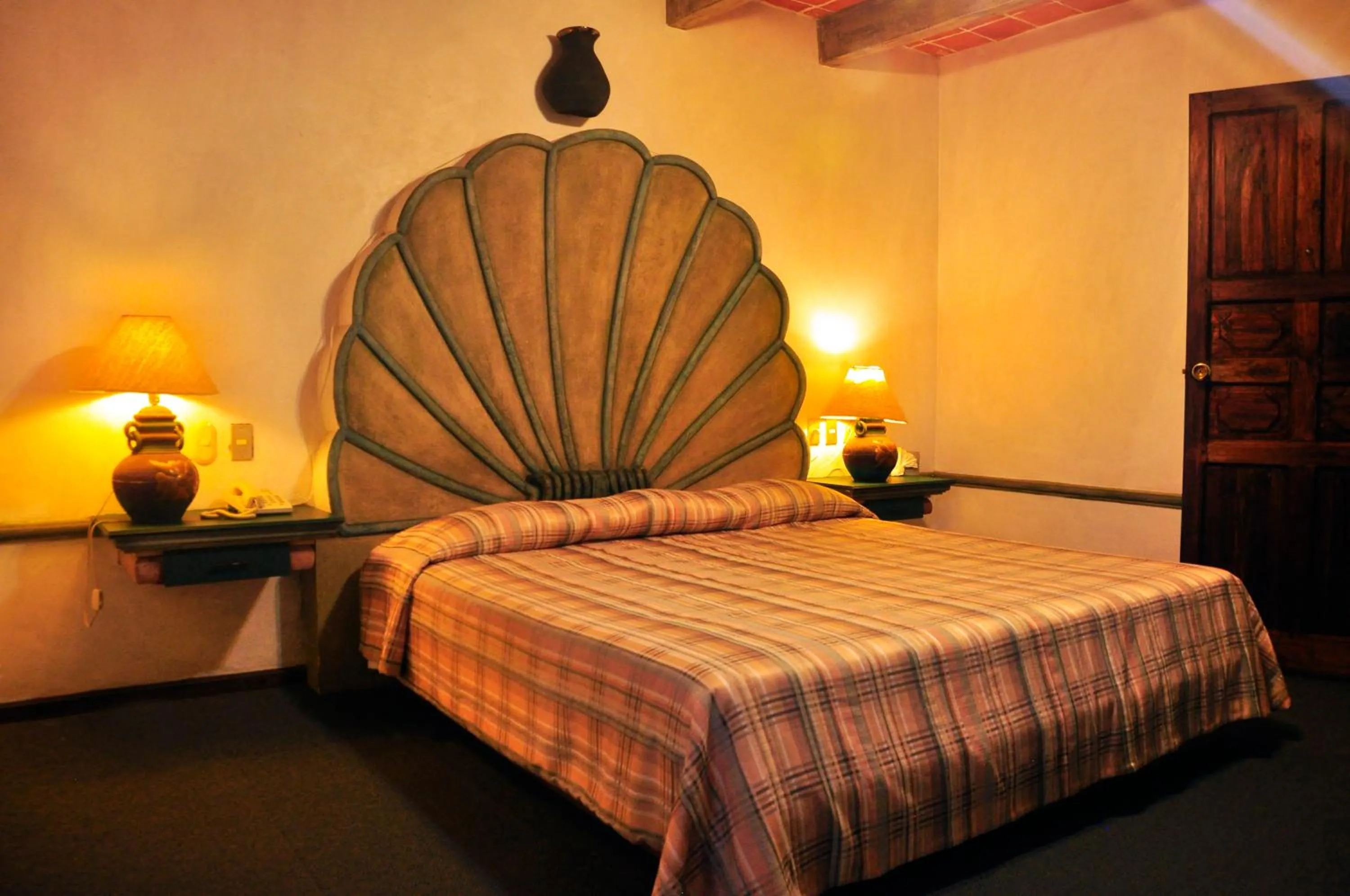 Bed in Hotel La Mansión