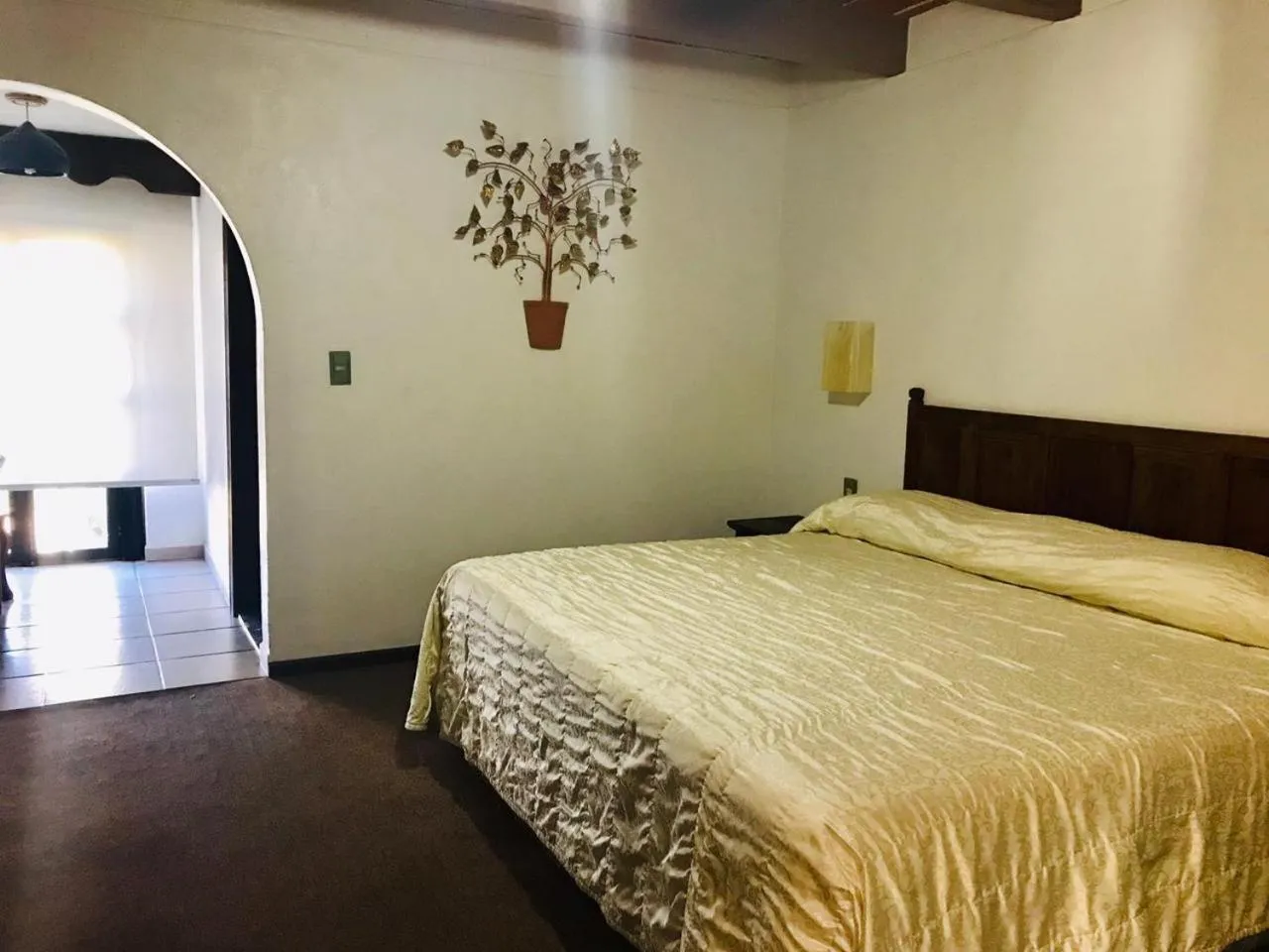 Bed in Hotel La Mansión