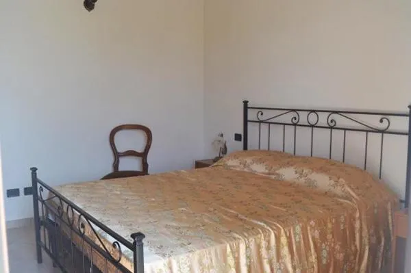 Bed in BeaStella Holiday Rooms