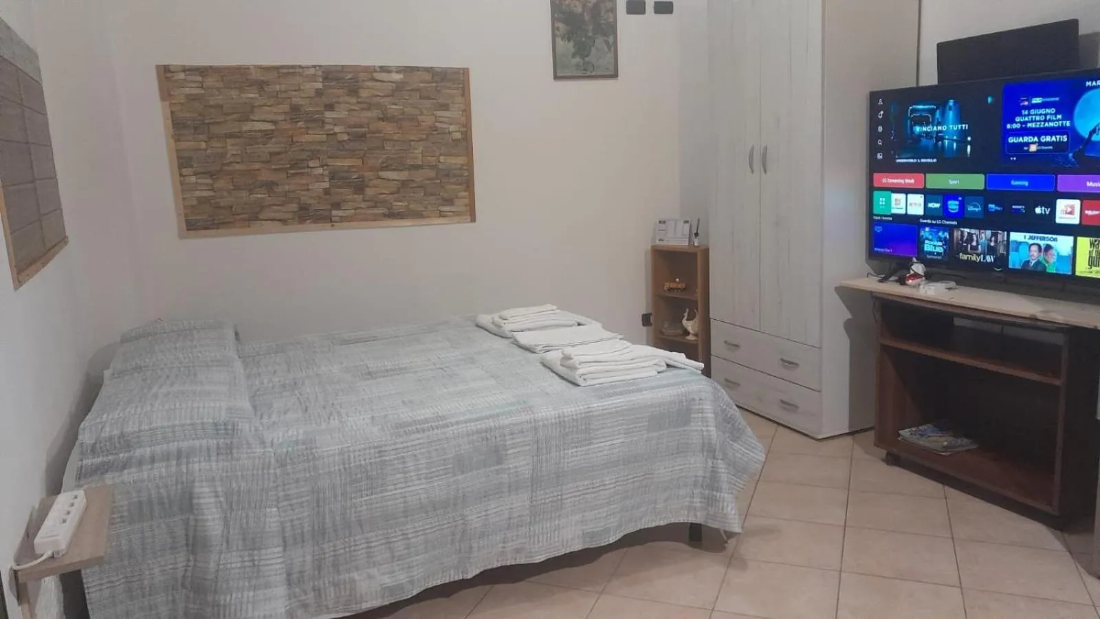 Bed in BeaStella Holiday Rooms