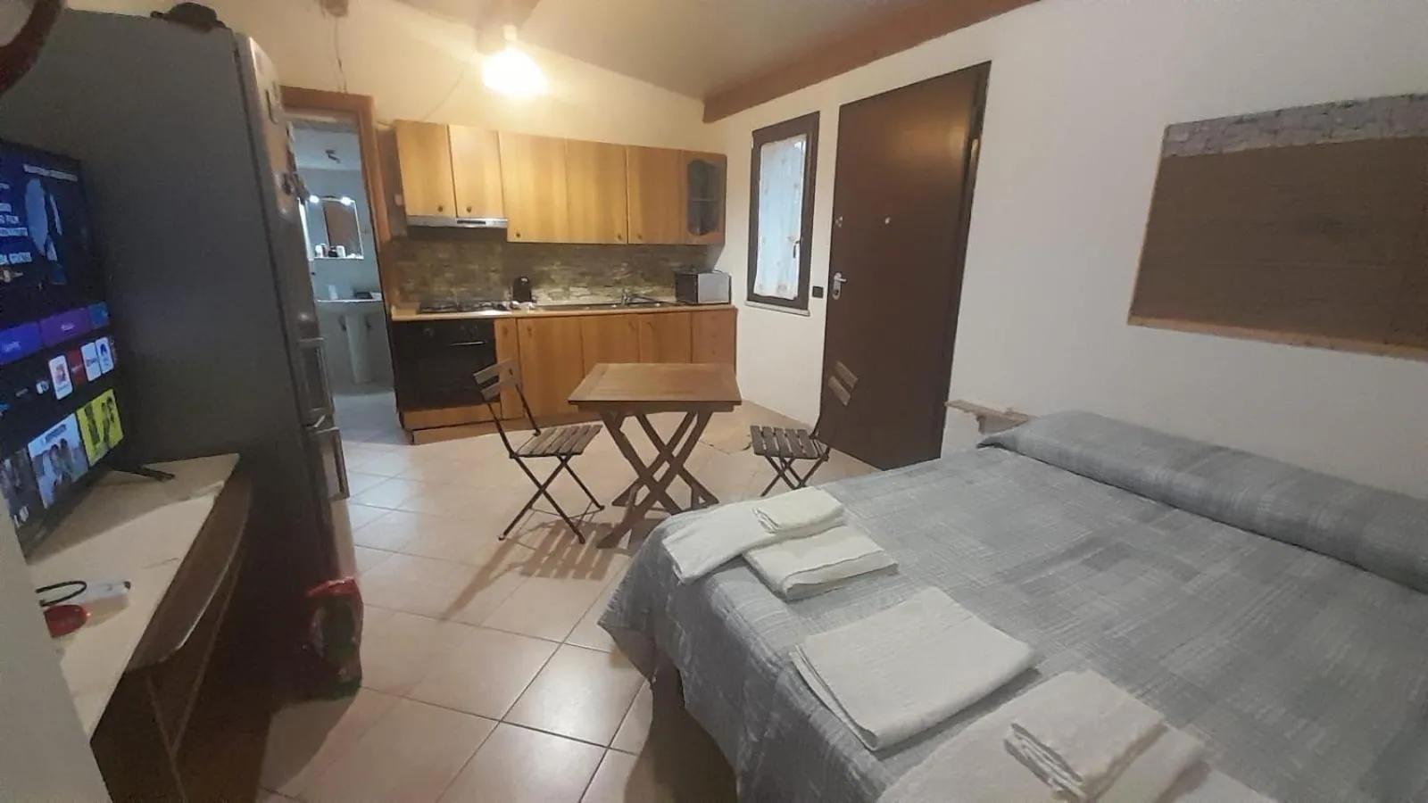 Bed in BeaStella Holiday Rooms