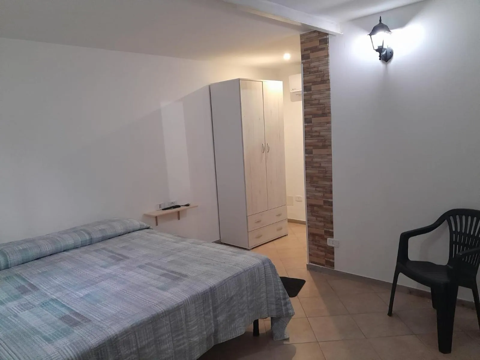 Bed in BeaStella Holiday Rooms