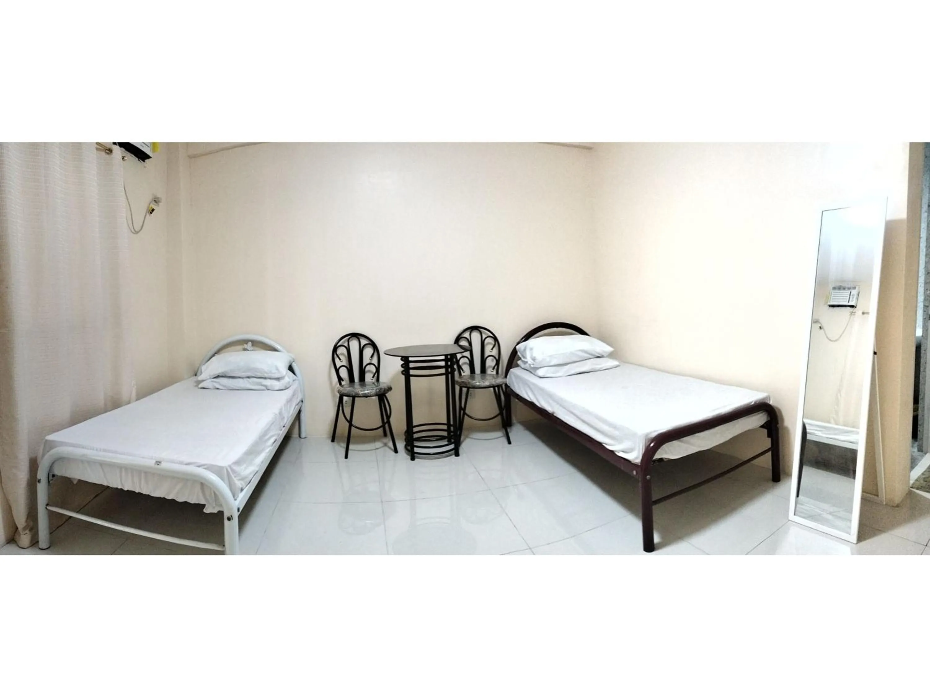 Standard Twin Room in OYO 800 Ddd Habitat Dormtel Bacolod