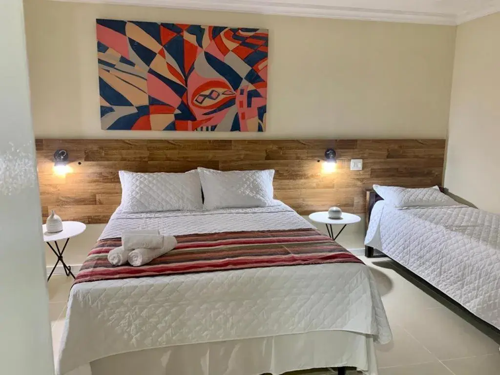 Triple Room in Pousada Pedras Brancas Triple Room in Pousada Pedras Brancas