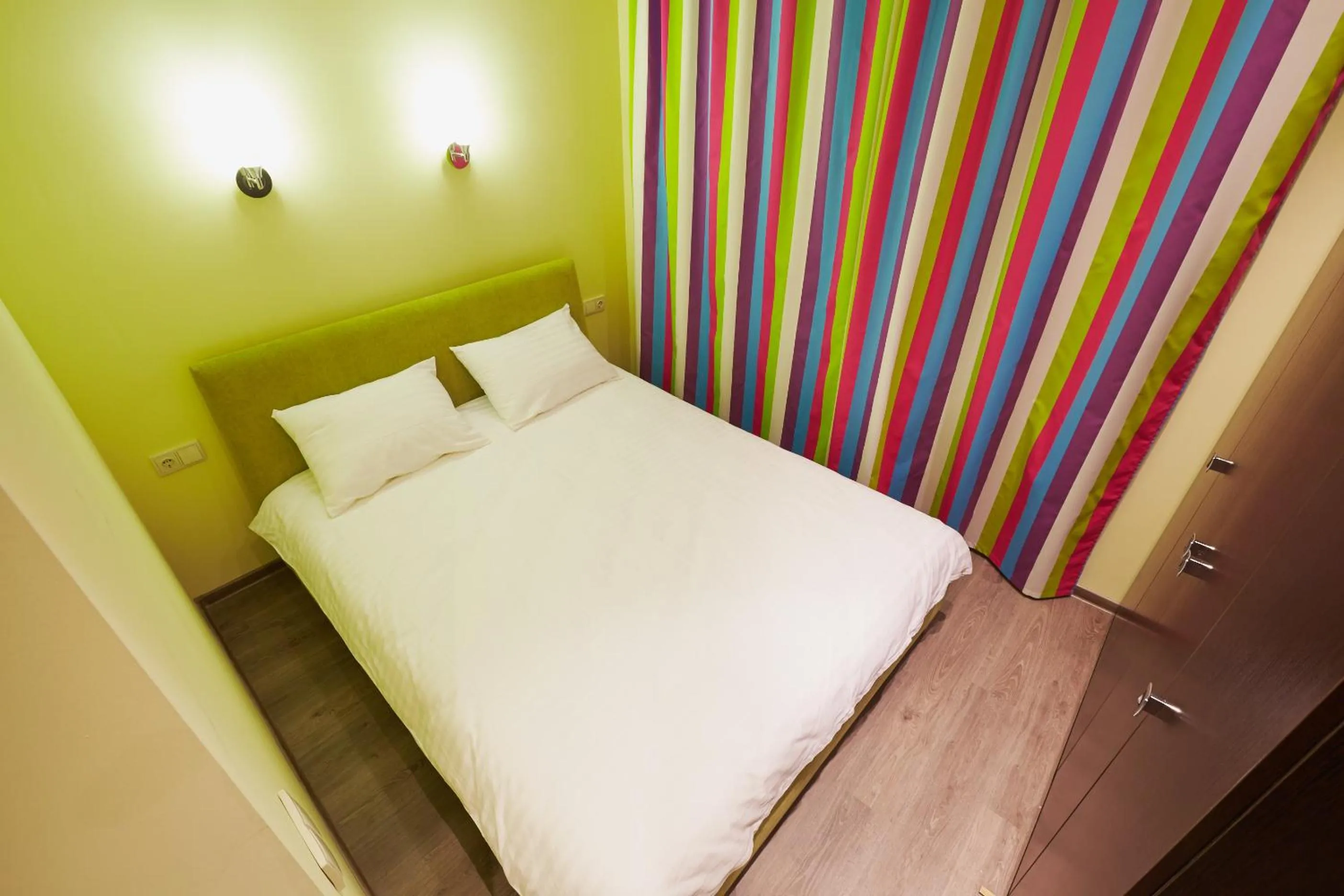 Bed in Apartment Fedkovycha