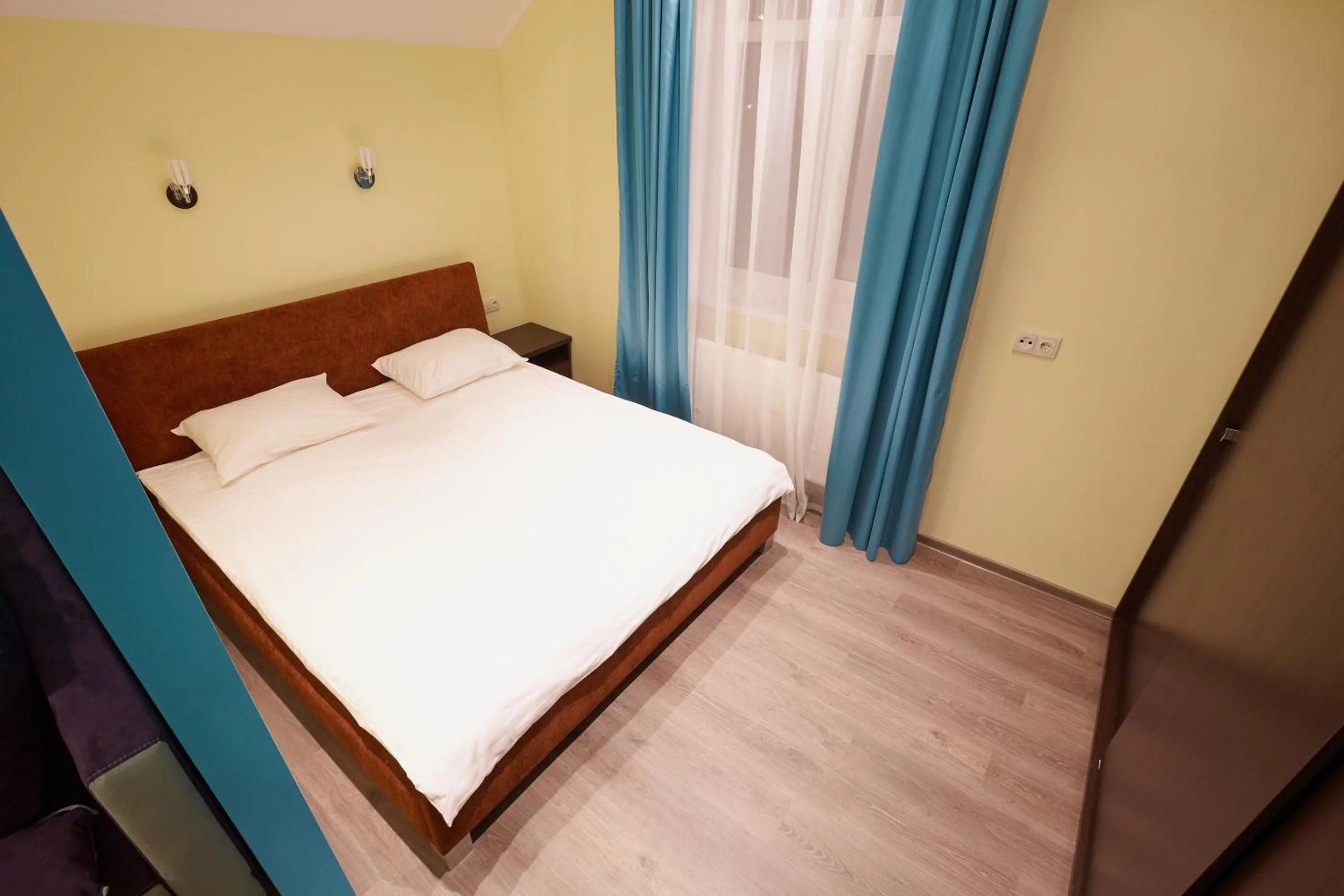 Bed in Apartment Fedkovycha