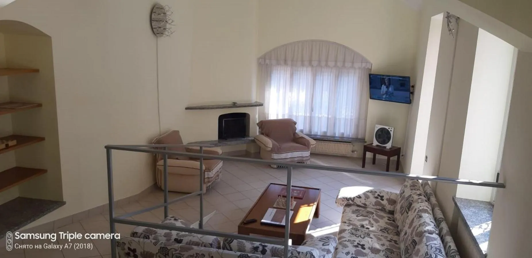 Communal lounge/ TV room in Villa Magnolia Lago Maggiore