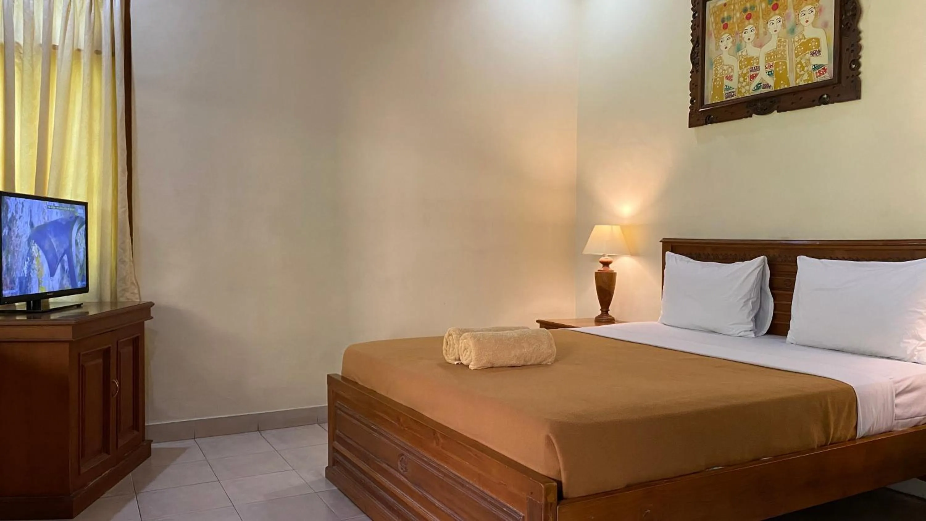 Bed in Bali Sandy Resort