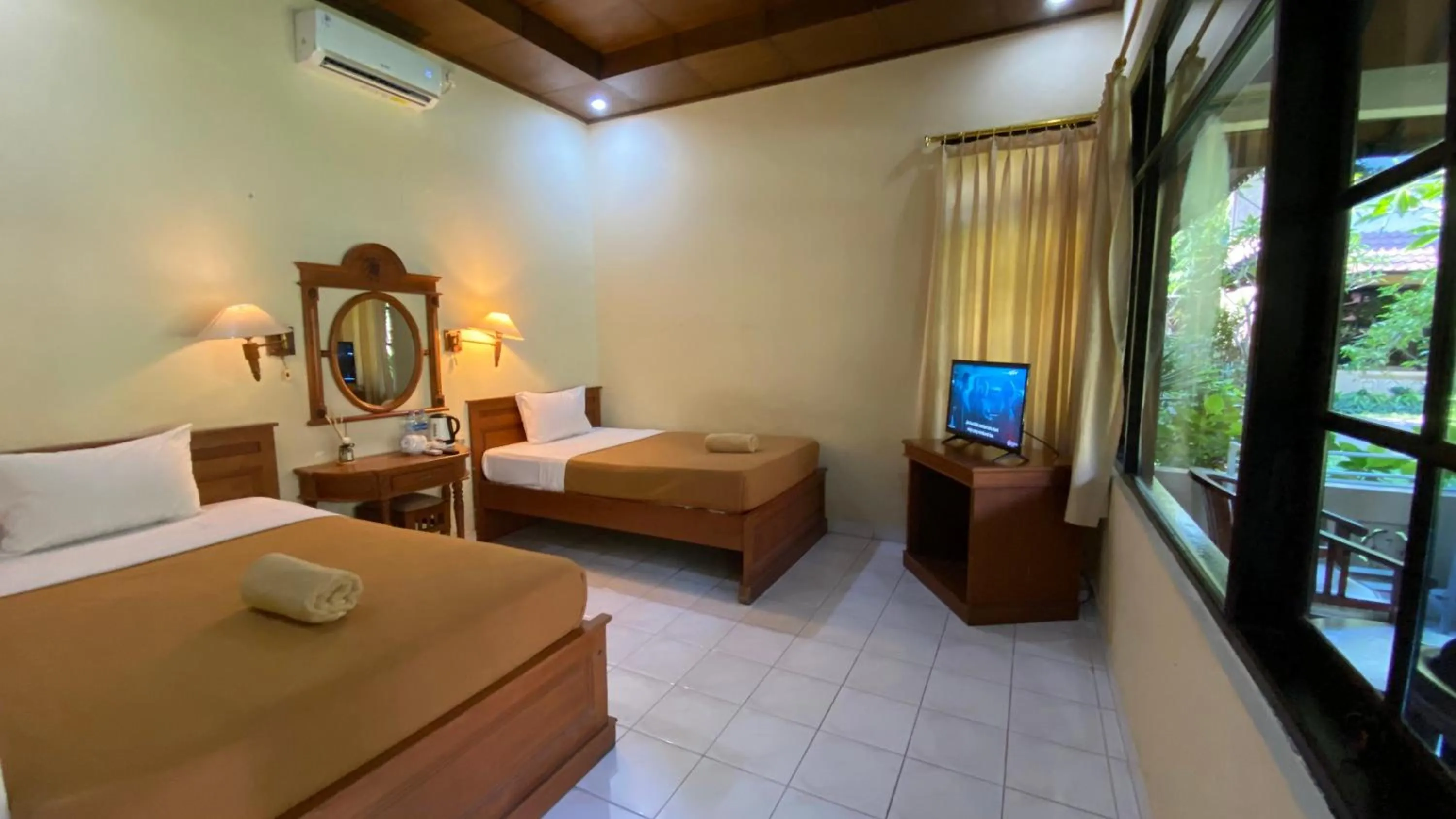 Bed in Bali Sandy Resort