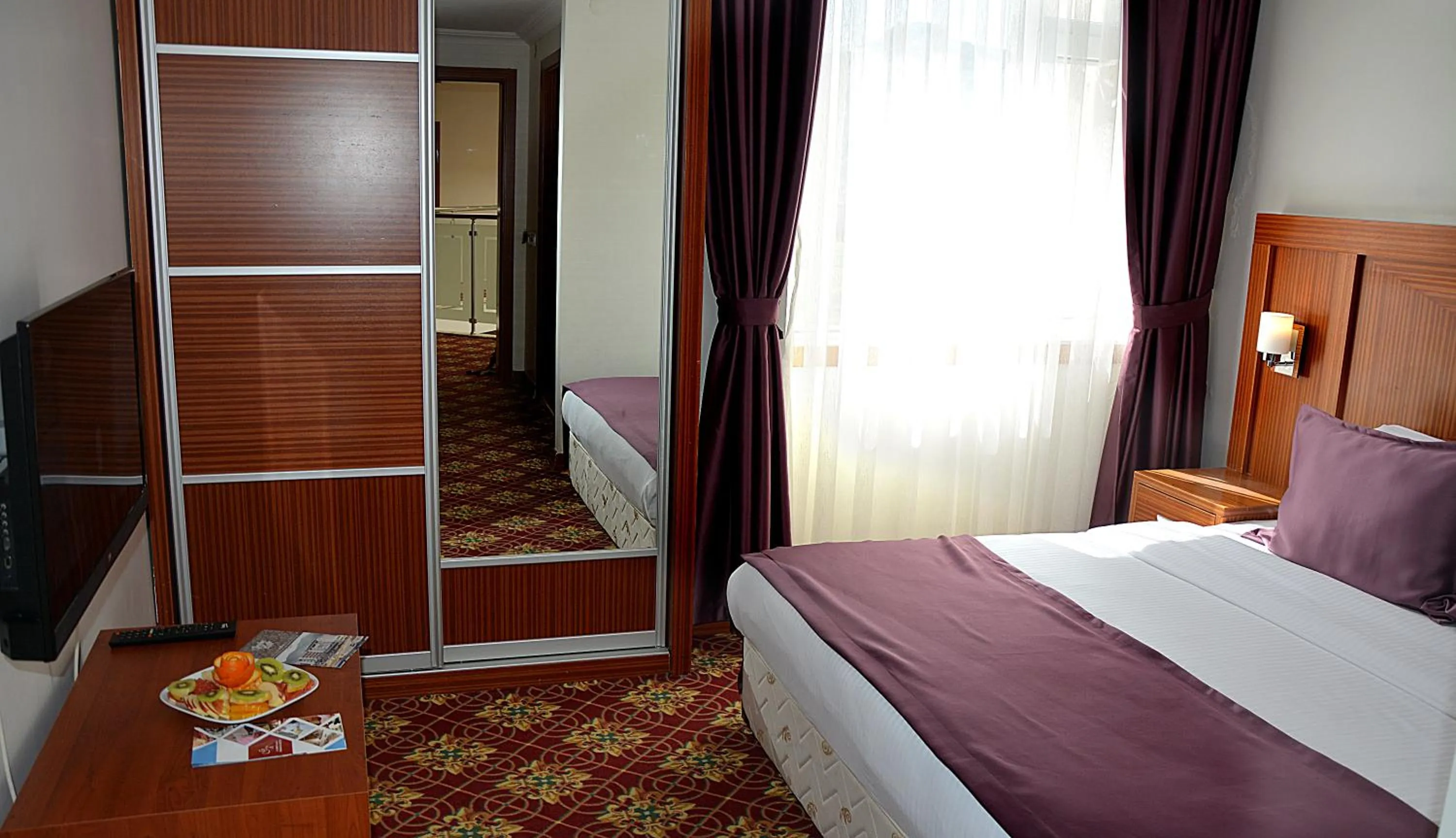 Bed in GARDEN KALE THERMAL HOTEL