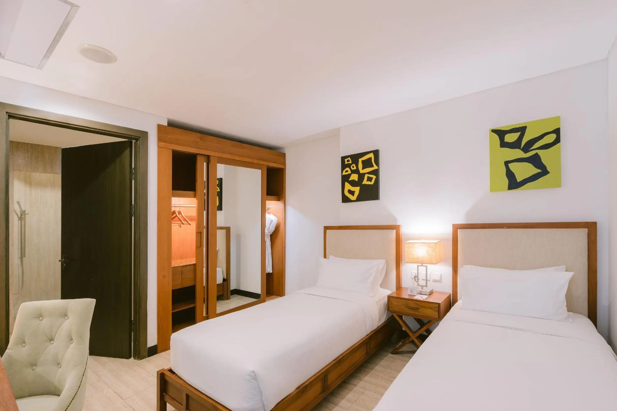 Bed in Lv8 Resort Hotel