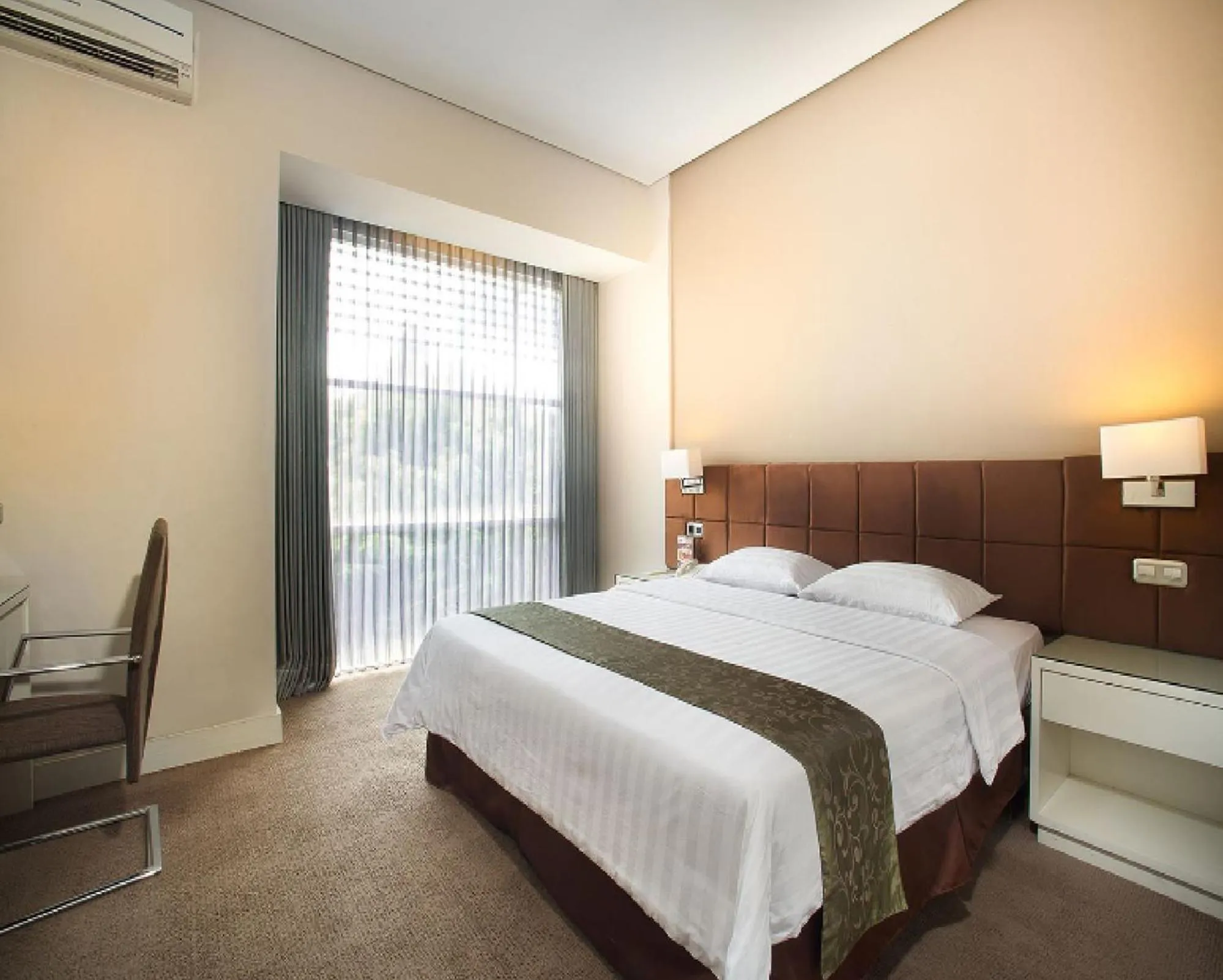 Bed in Grand Kecubung Hotel