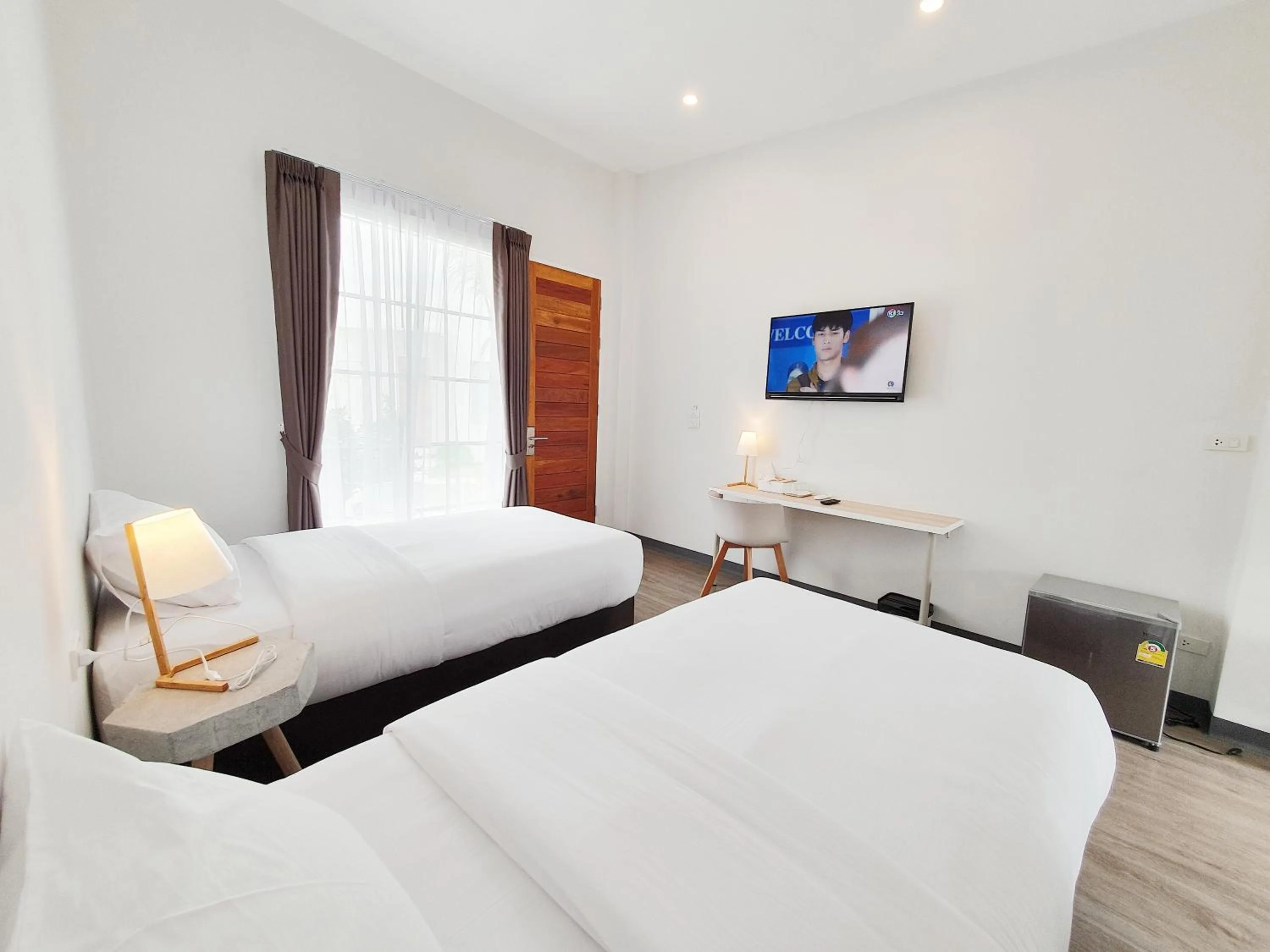 Bed in MEET Boutique Resort