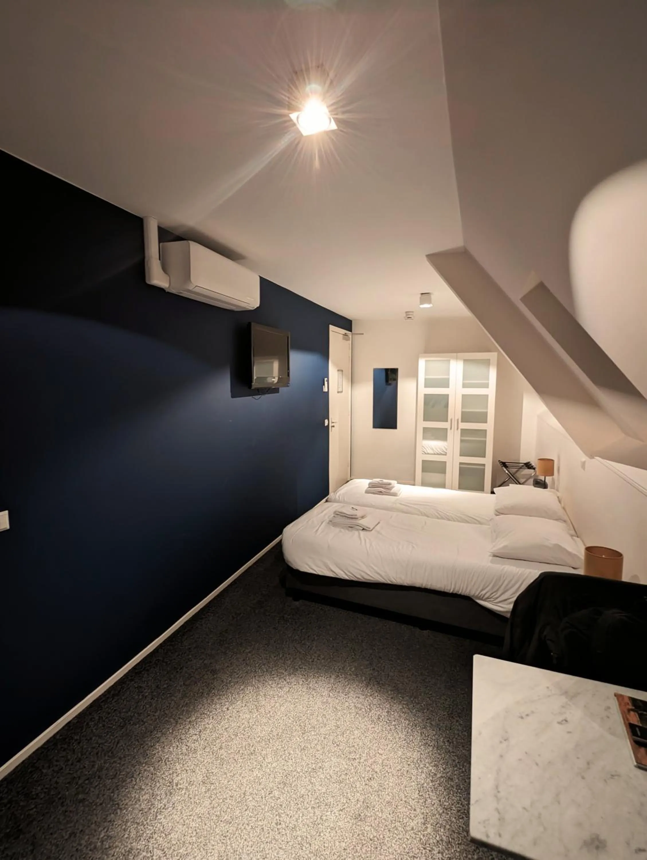 Bed in OTTO Boutique Hotel