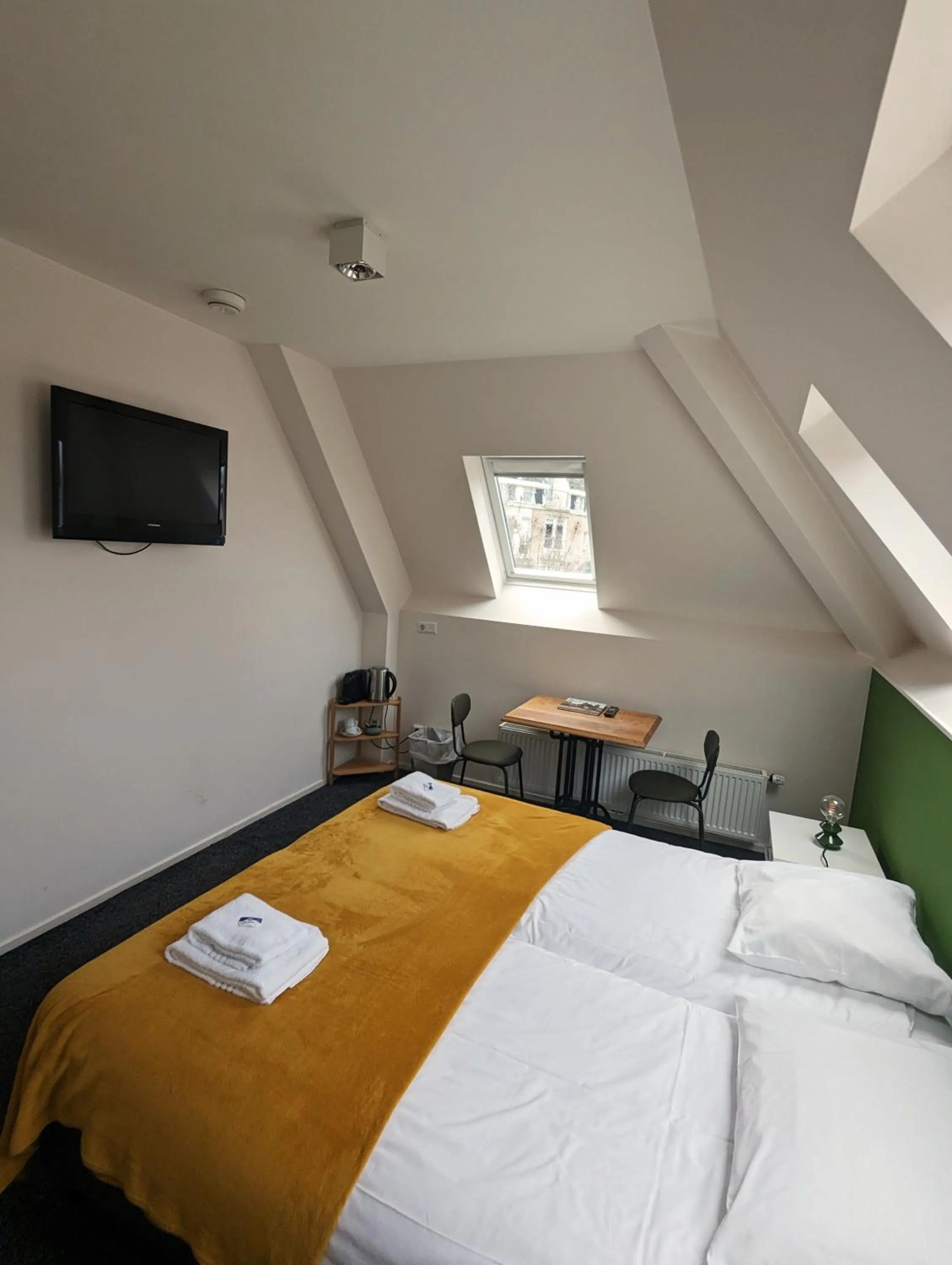 Bed in OTTO Boutique Hotel