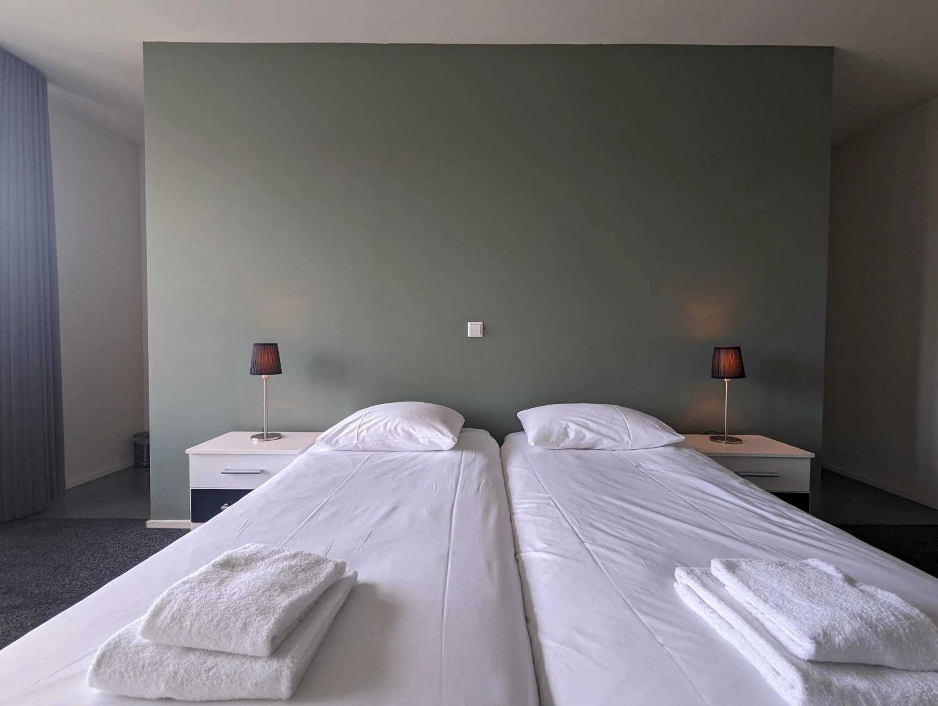 Bed in OTTO Boutique Hotel