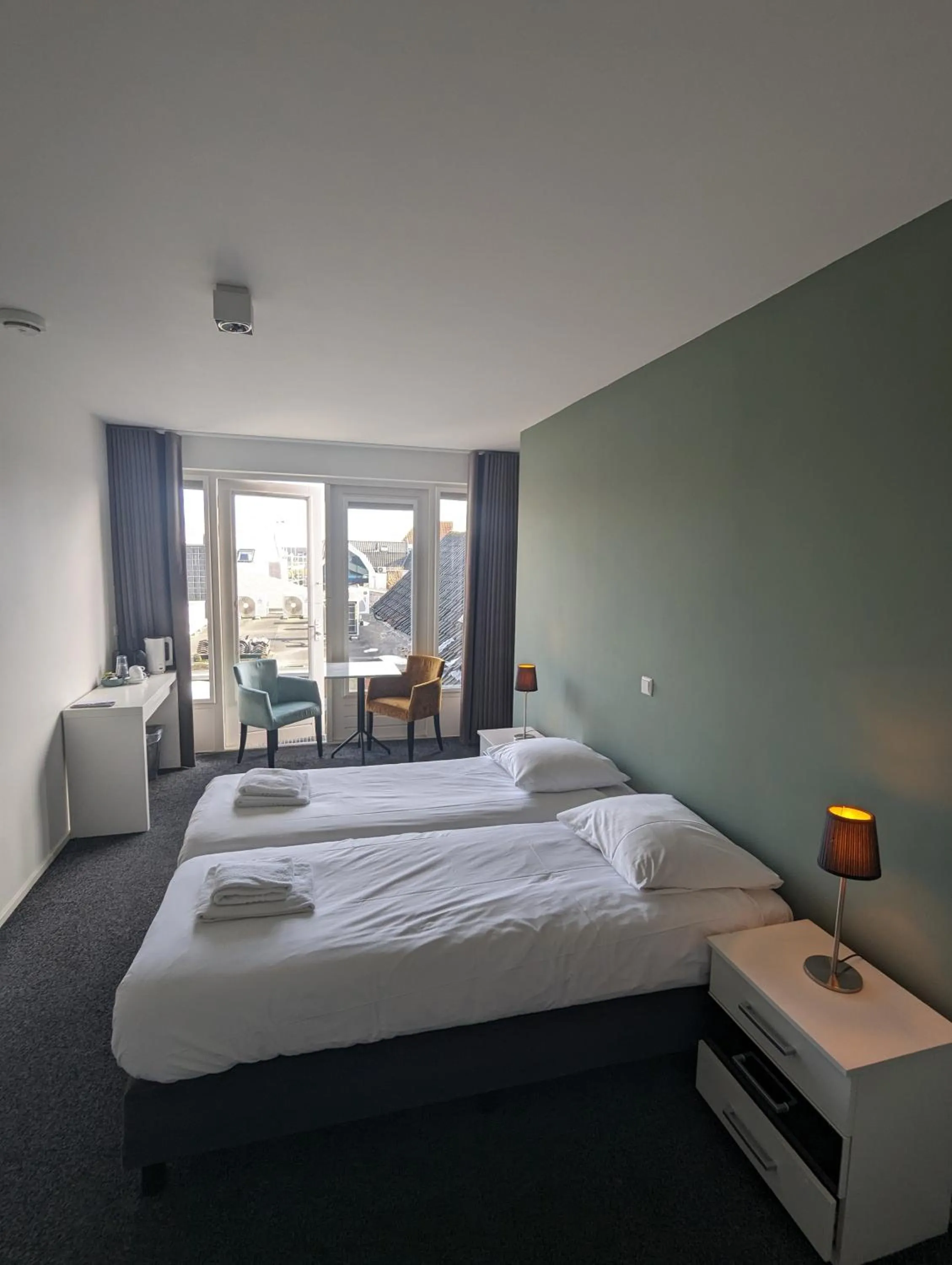 Bed in OTTO Boutique Hotel