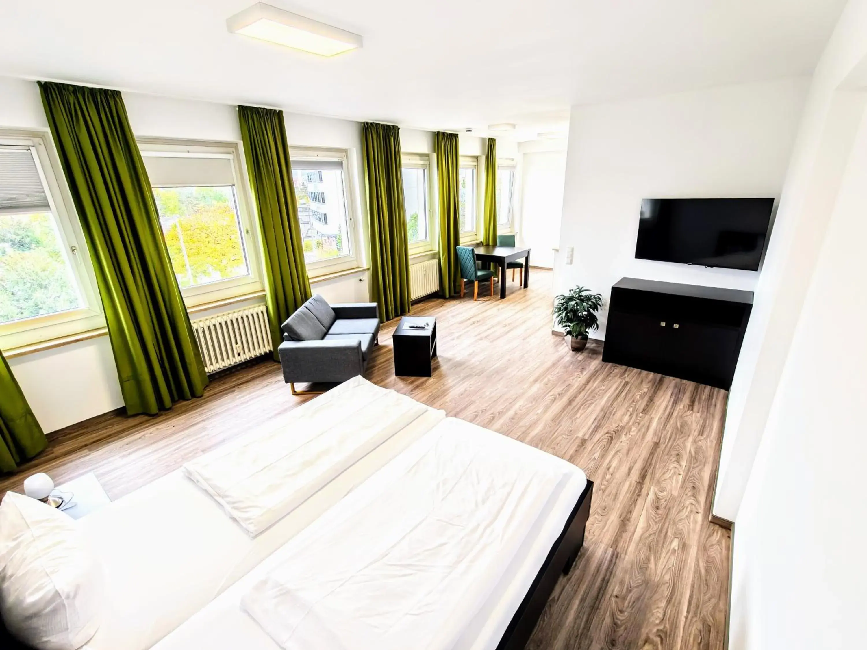 Living room, Bed in Boardinghouse - Stadtvilla Budget Living room, Bed in Boardinghouse - Stadtvilla Budget