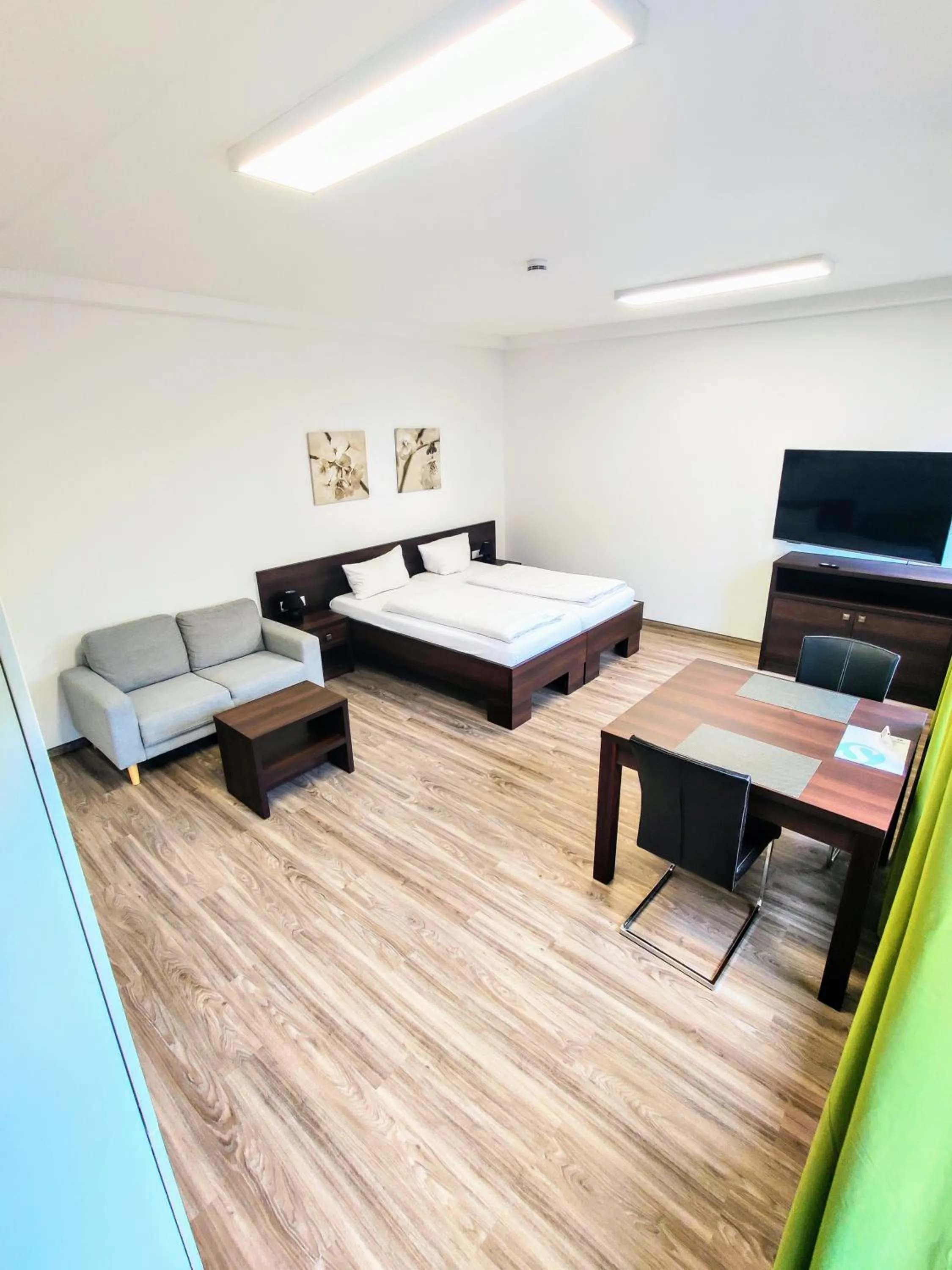 Living room, Bed in Boardinghouse - Stadtvilla Budget