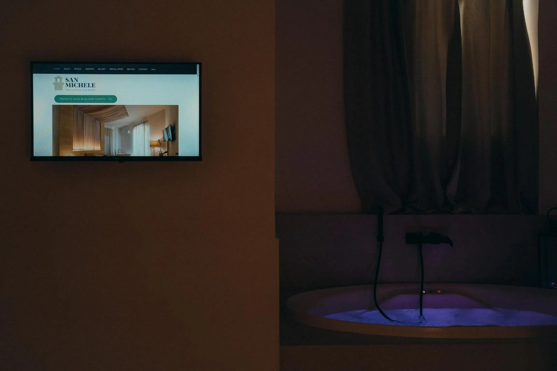 TV and multimedia in San Michele Rooms & Private SPA