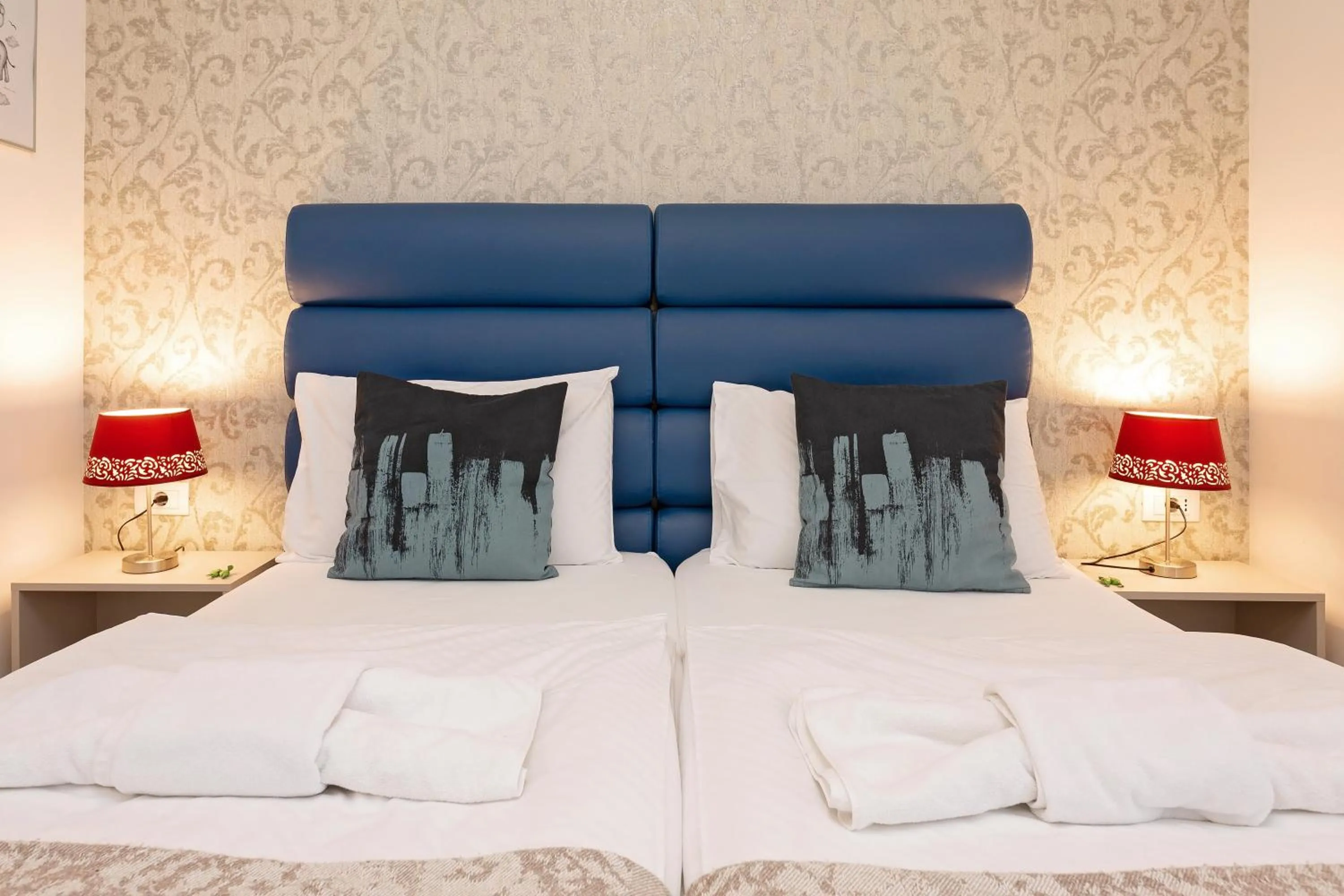 Decorative detail, Bed in S. Martino Rooms