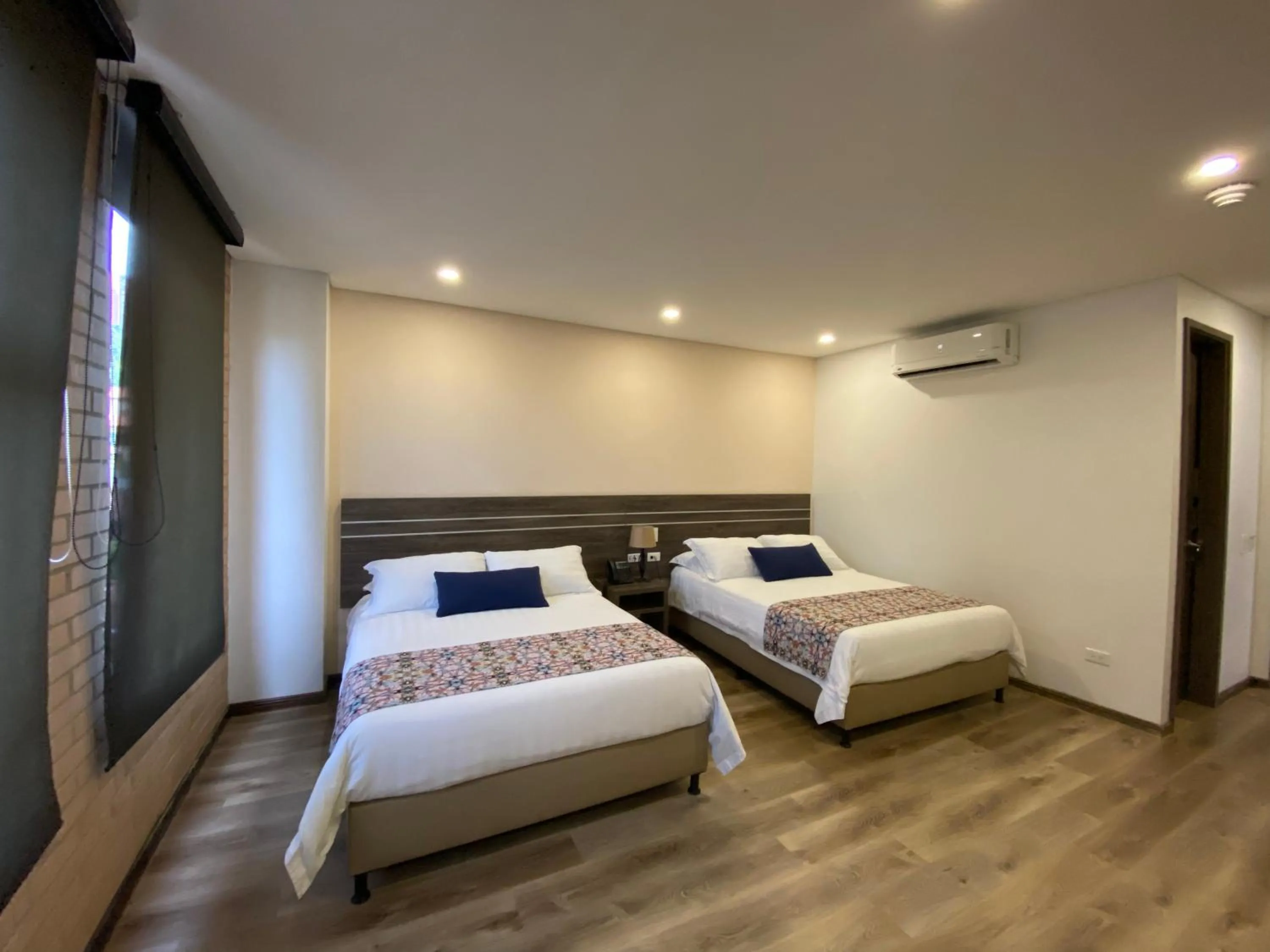Bed in EcoHub Hotel Medellin