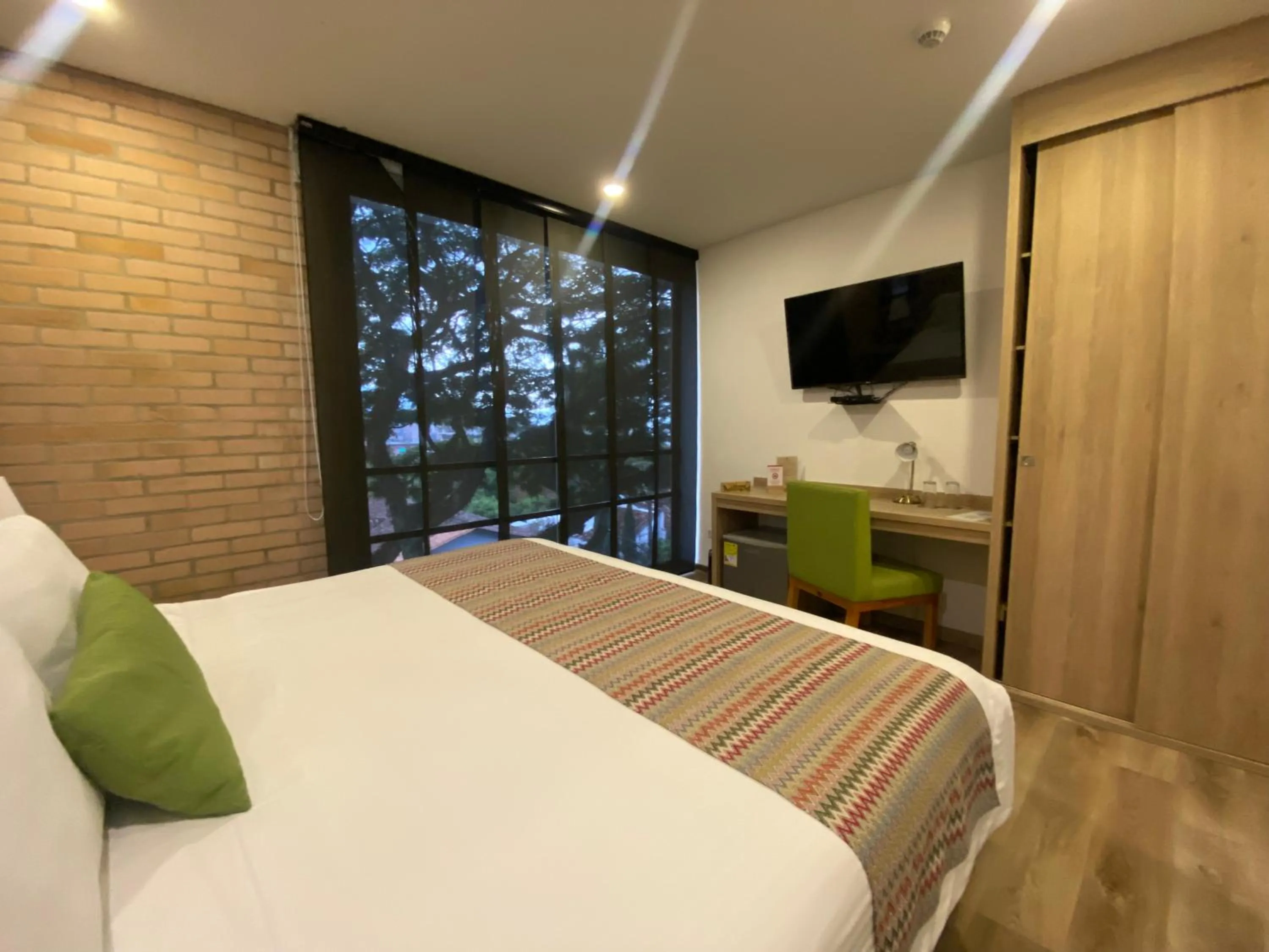 Bed in EcoHub Hotel Medellin