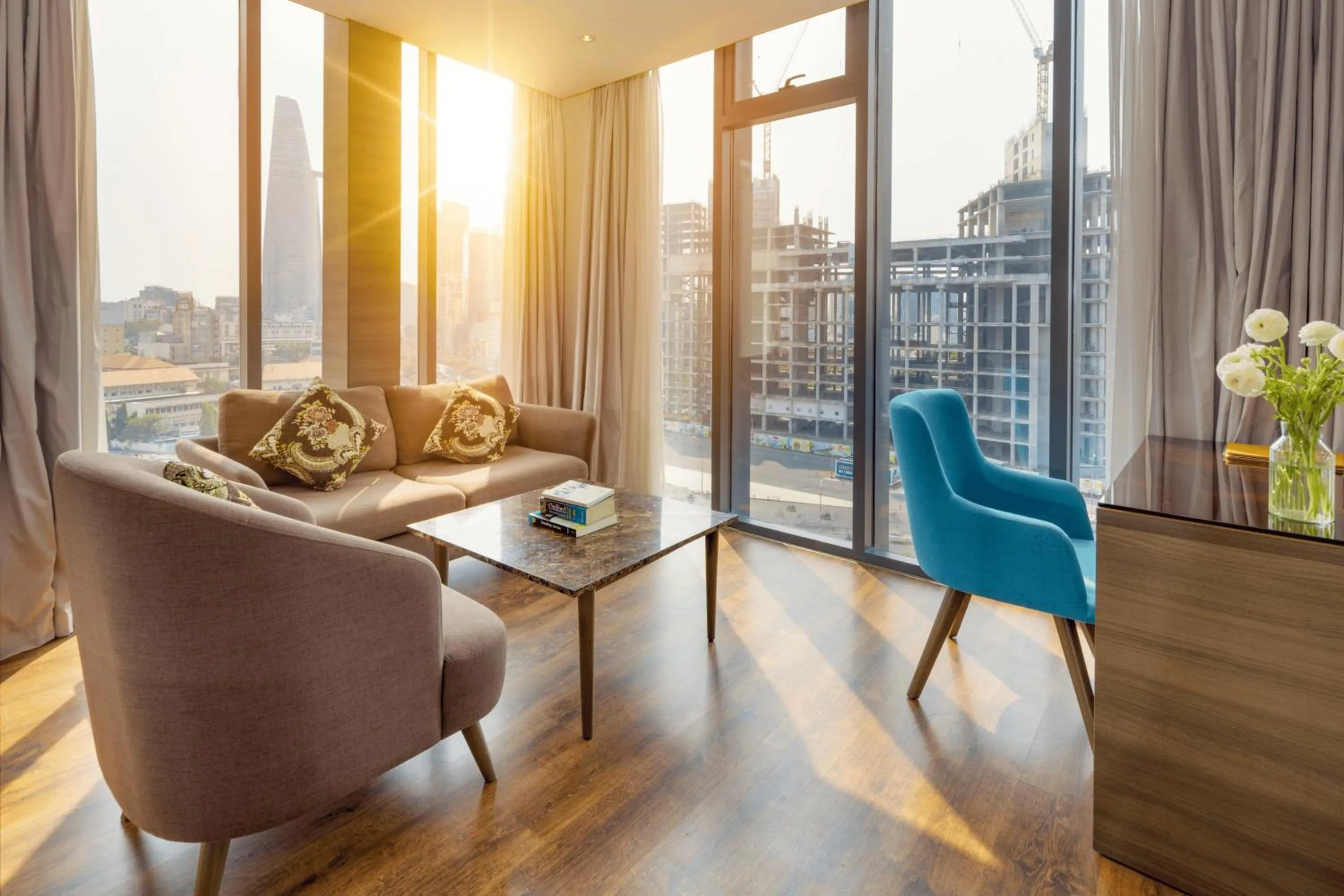 Seating area in Winsuites Saigon Hotel