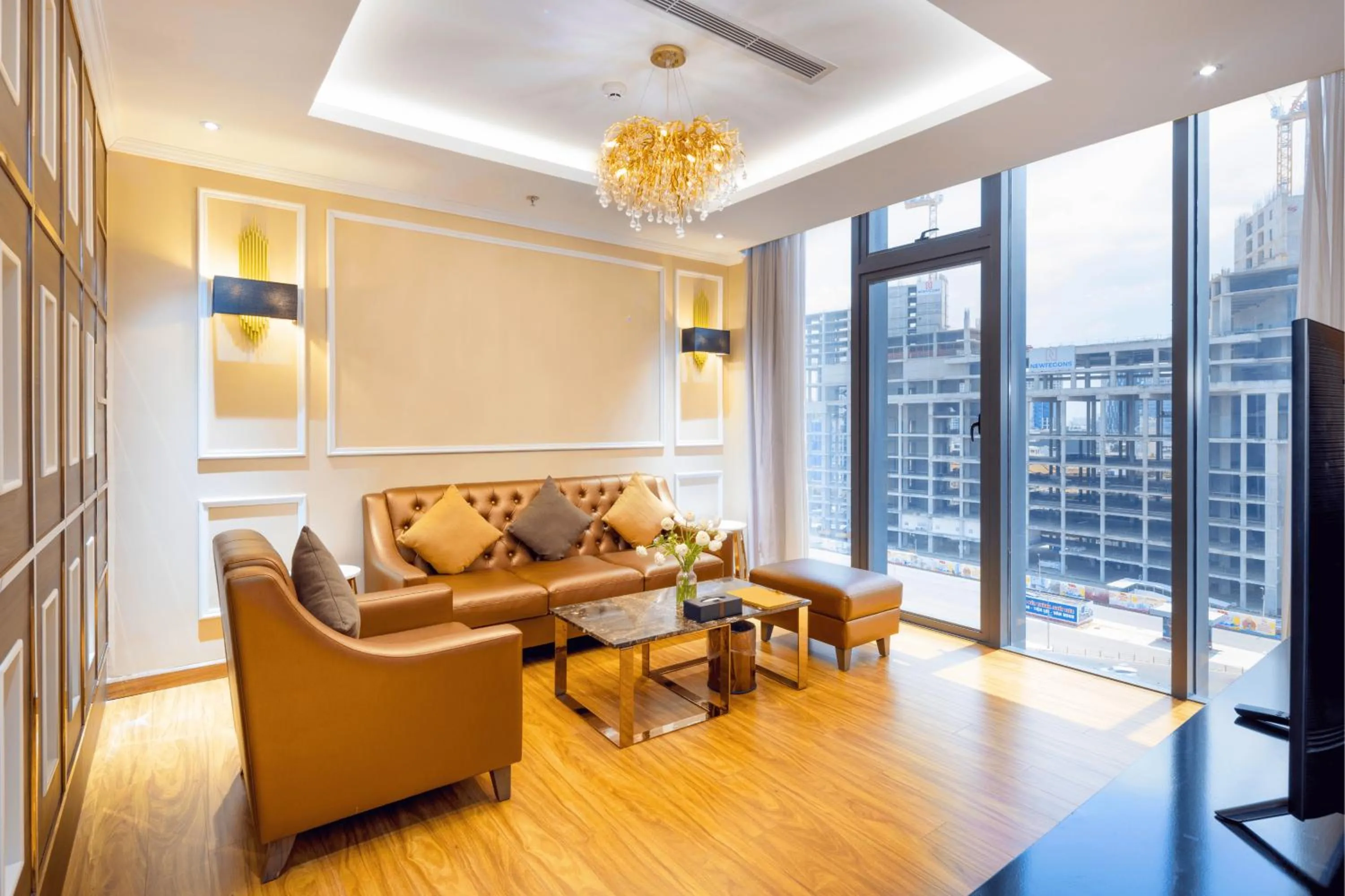 Living room in Winsuites Saigon Hotel