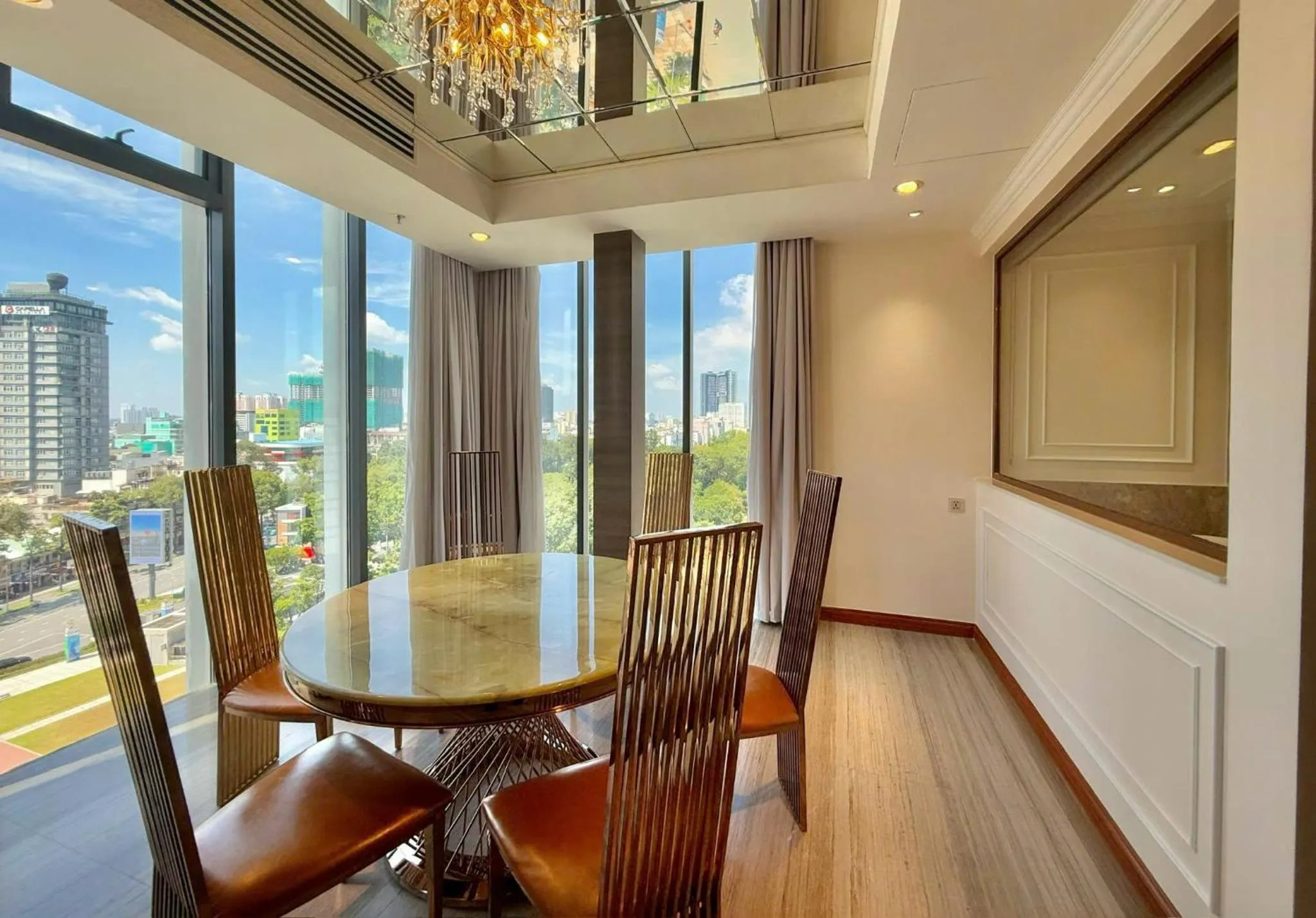 Living room in Winsuites Saigon Hotel