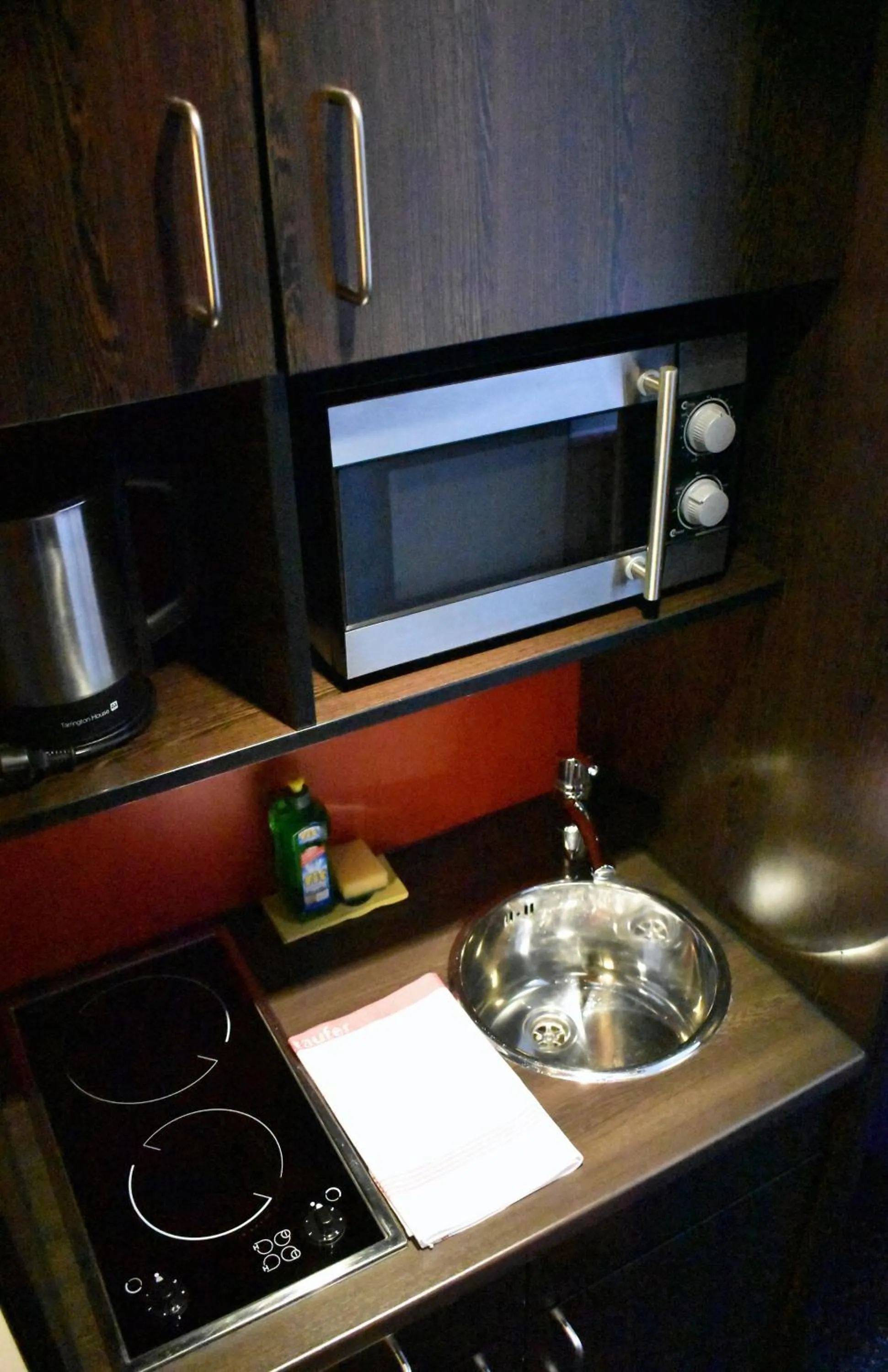 Kitchen or kitchenette in Stay2Munich Hotel & Serviced Apartments