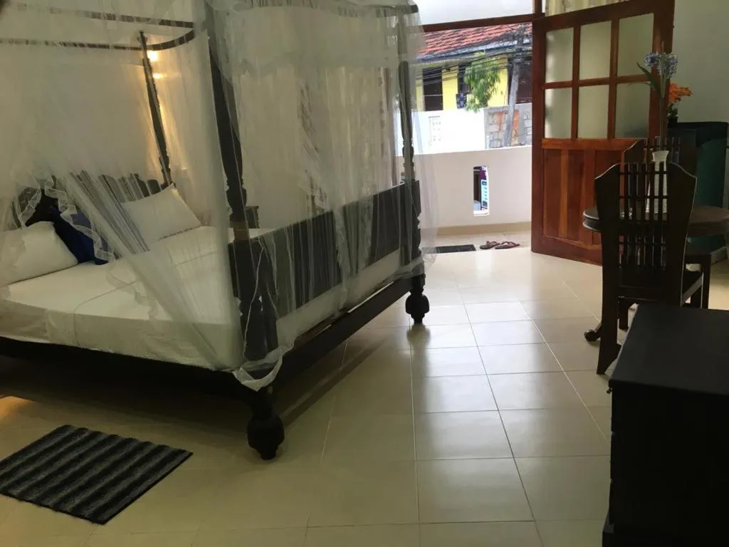 Photo of the whole room, Bed in Galle Fantacy