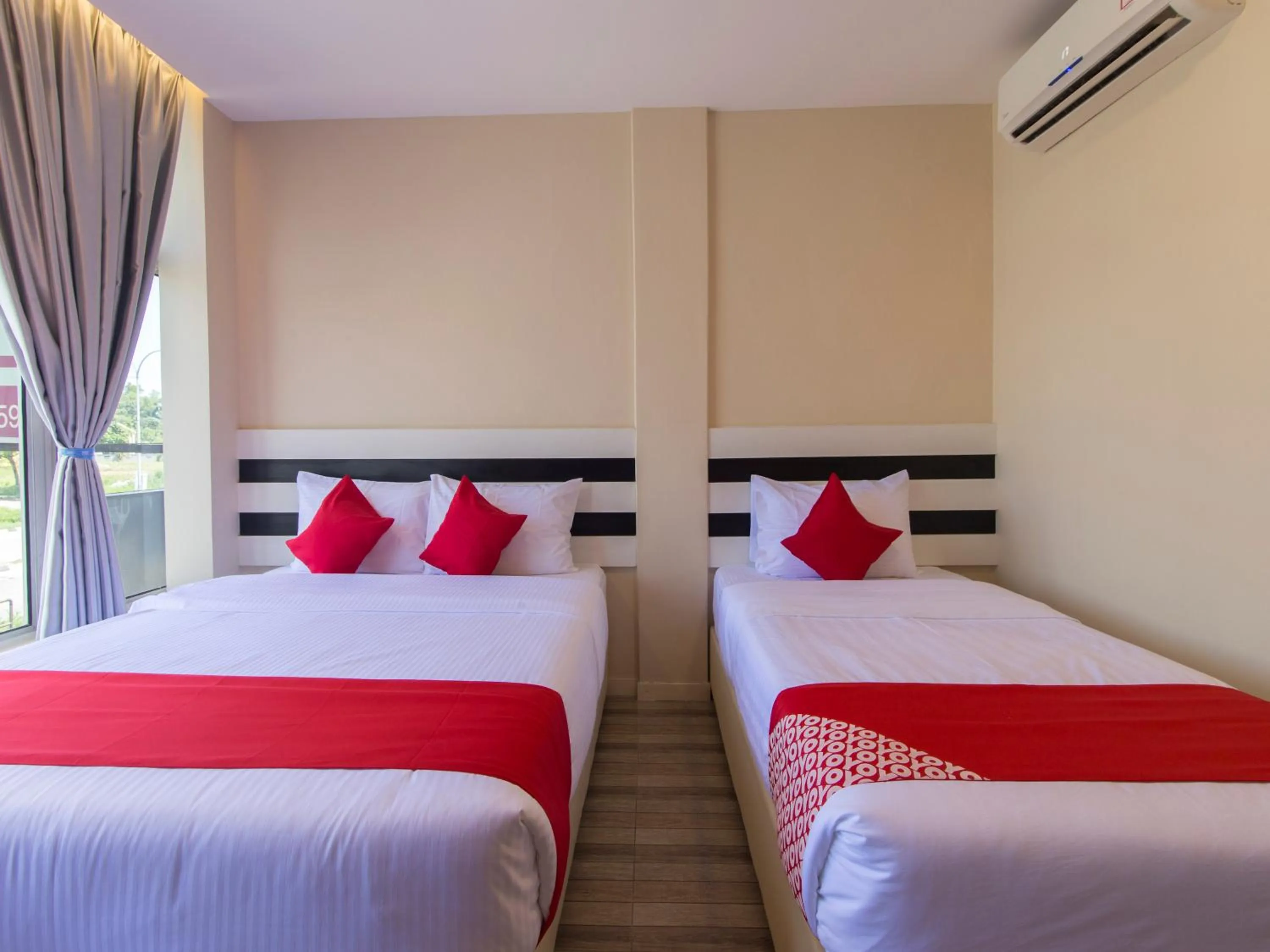 Bedroom, Bed in Super OYO 1145 Lea Guest House & Cafe