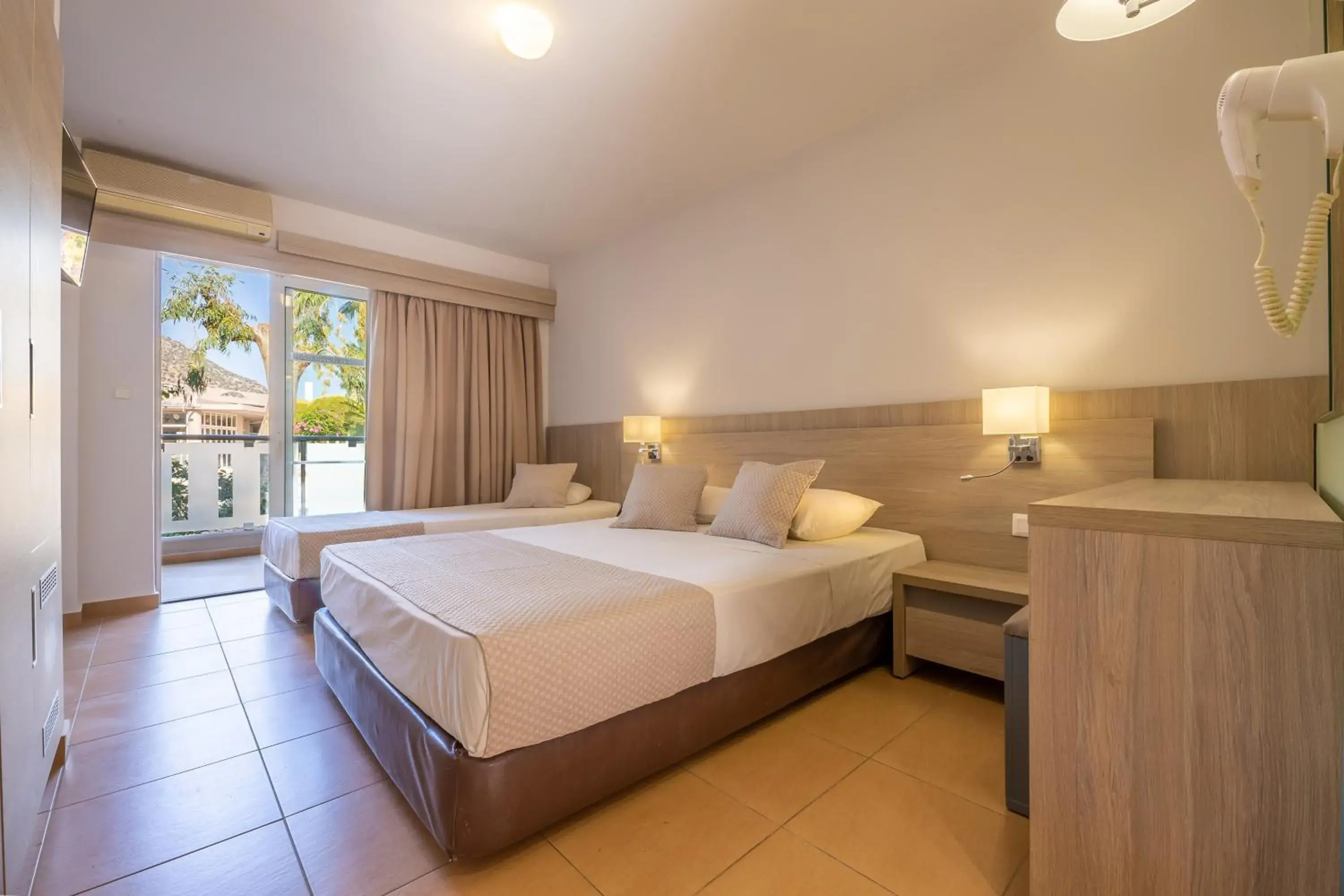 Bed in Akti Beach Club Bed in Akti Beach Club