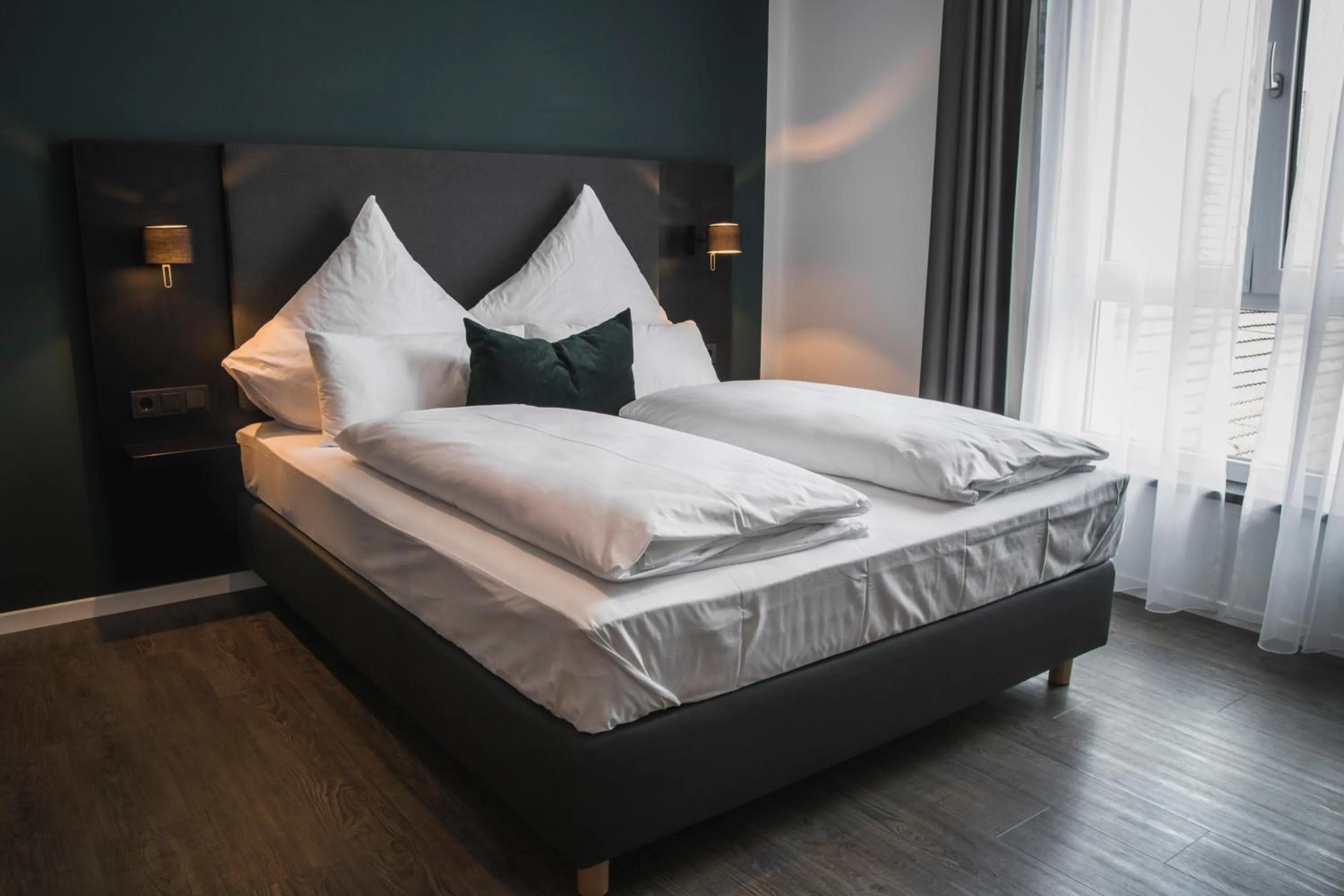 Photo of the whole room, Bed in Hayta Hotel Stuttgart Airport Messe