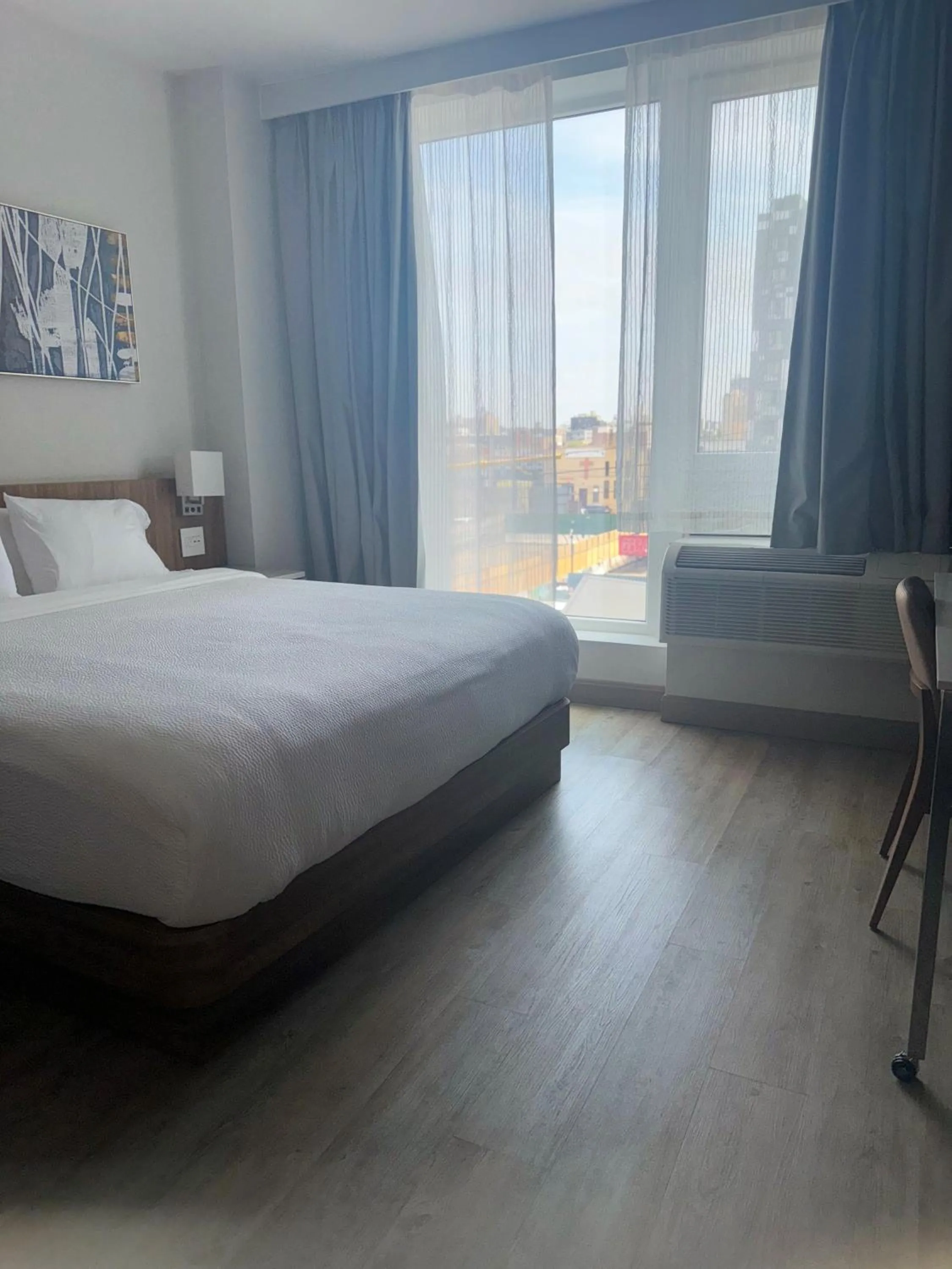 Bedroom, Bed in TownePlace Suites by Marriott New York Long Island City